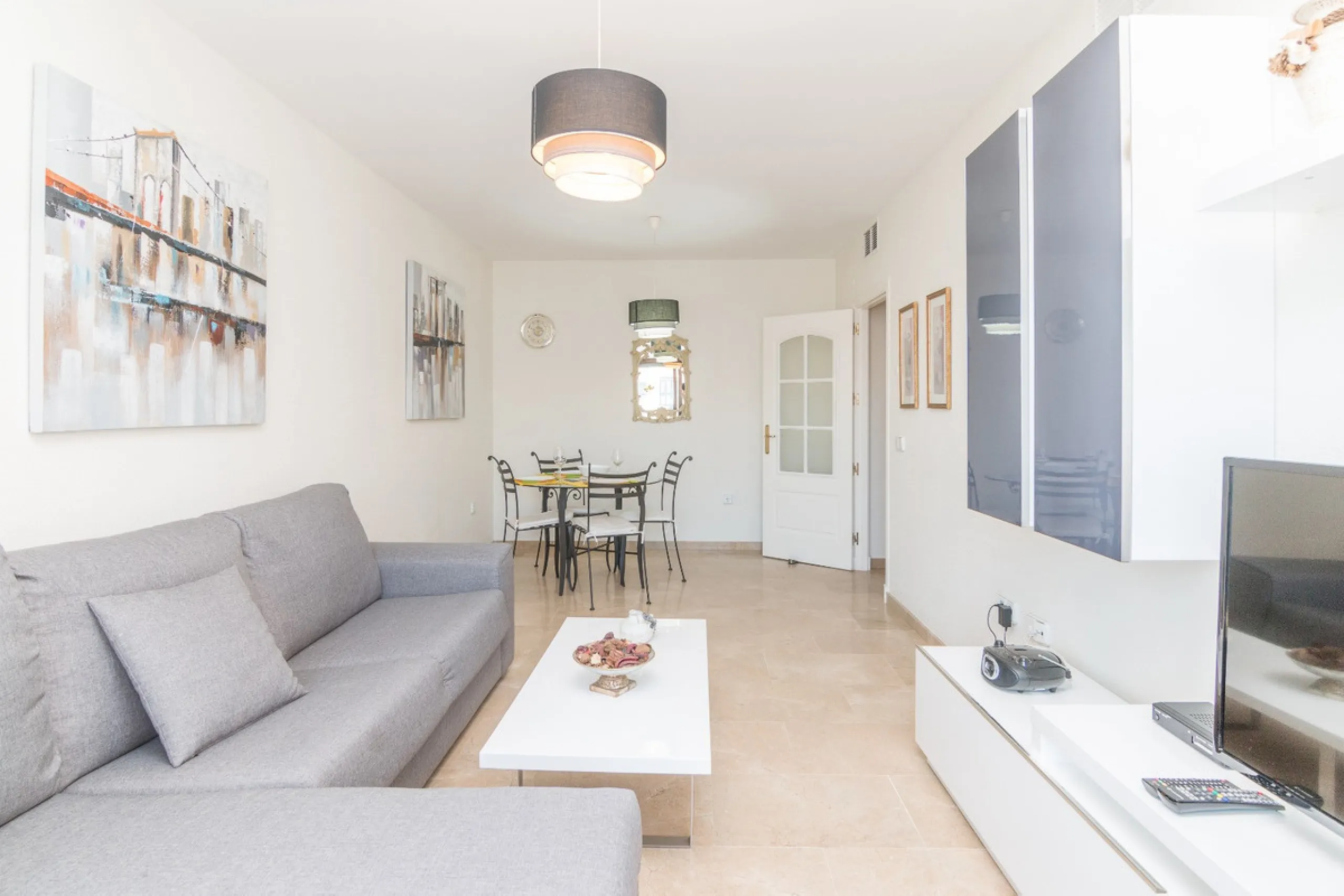 This exceptional two-bedroom, two-bathroom apartment is perfectly positioned on the front line of the beach in the sought-after area of Puerto La Duquesa, Manilva, Malaga. Offering a harmonious blend of comfort, style, and convenience, the property stands