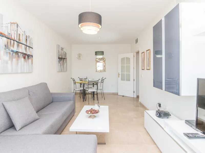 This exceptional two-bedroom, two-bathroom apartment is perfectly positioned on the front line of the beach in the sought-after area of Puerto La Duquesa, Manilva, Malaga. Offering a harmonious blend of comfort, style, and convenience, the property stands
