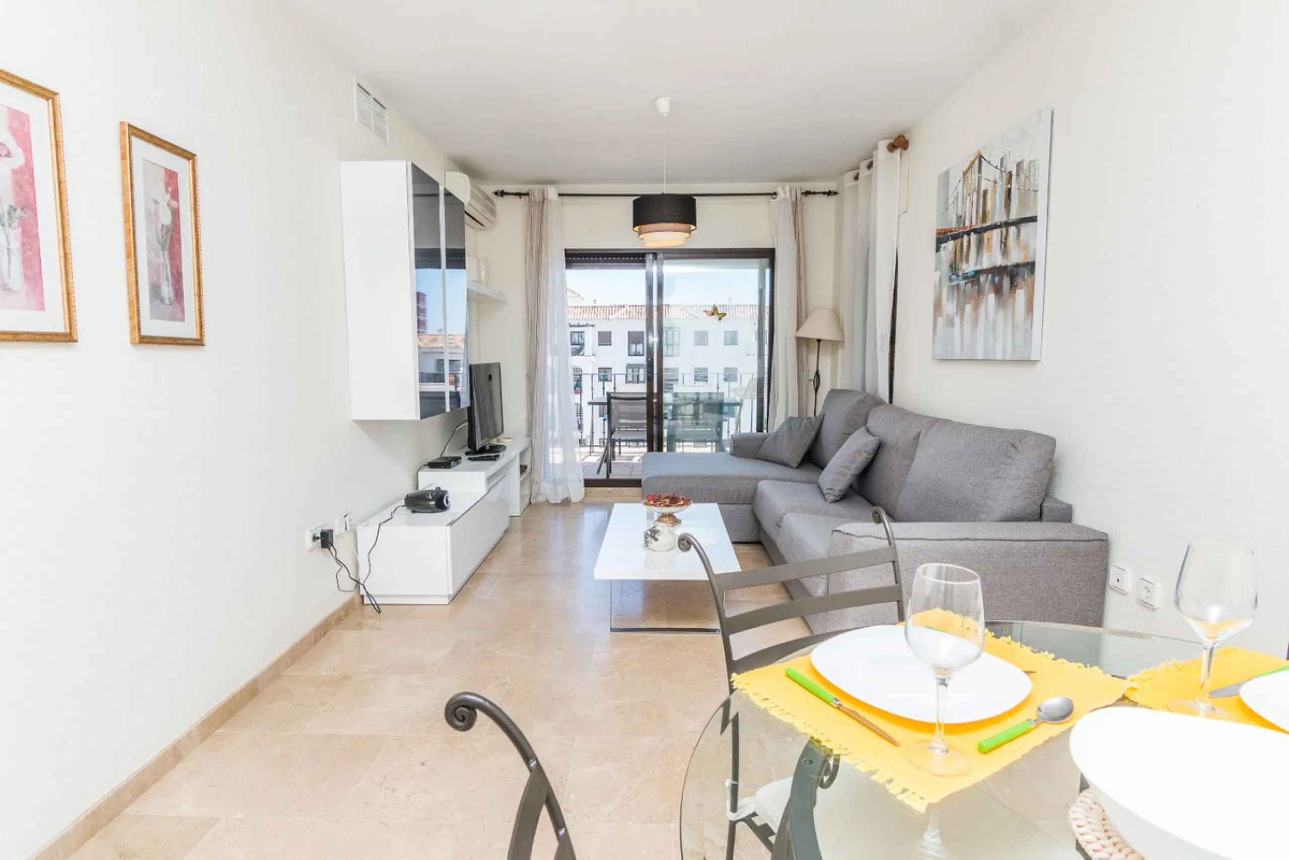 This exceptional two-bedroom, two-bathroom apartment is perfectly positioned on the front line of the beach in the sought-after area of Puerto La Duquesa, Manilva, Malaga. Offering a harmonious blend of comfort, style, and convenience, the property stands