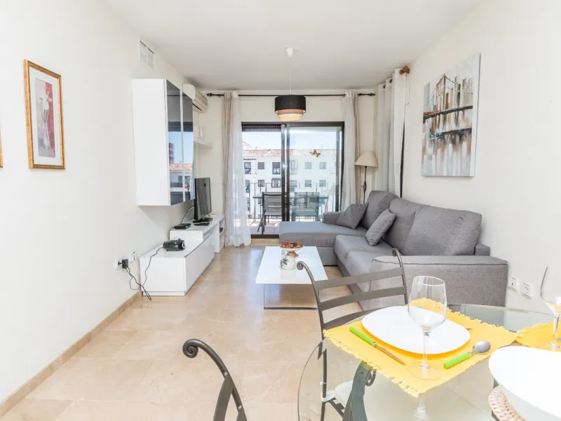 This exceptional two-bedroom, two-bathroom apartment is perfectly positioned on the front line of the beach in the sought-after area of Puerto La Duquesa, Manilva, Malaga. Offering a harmonious blend of comfort, style, and convenience, the property stands