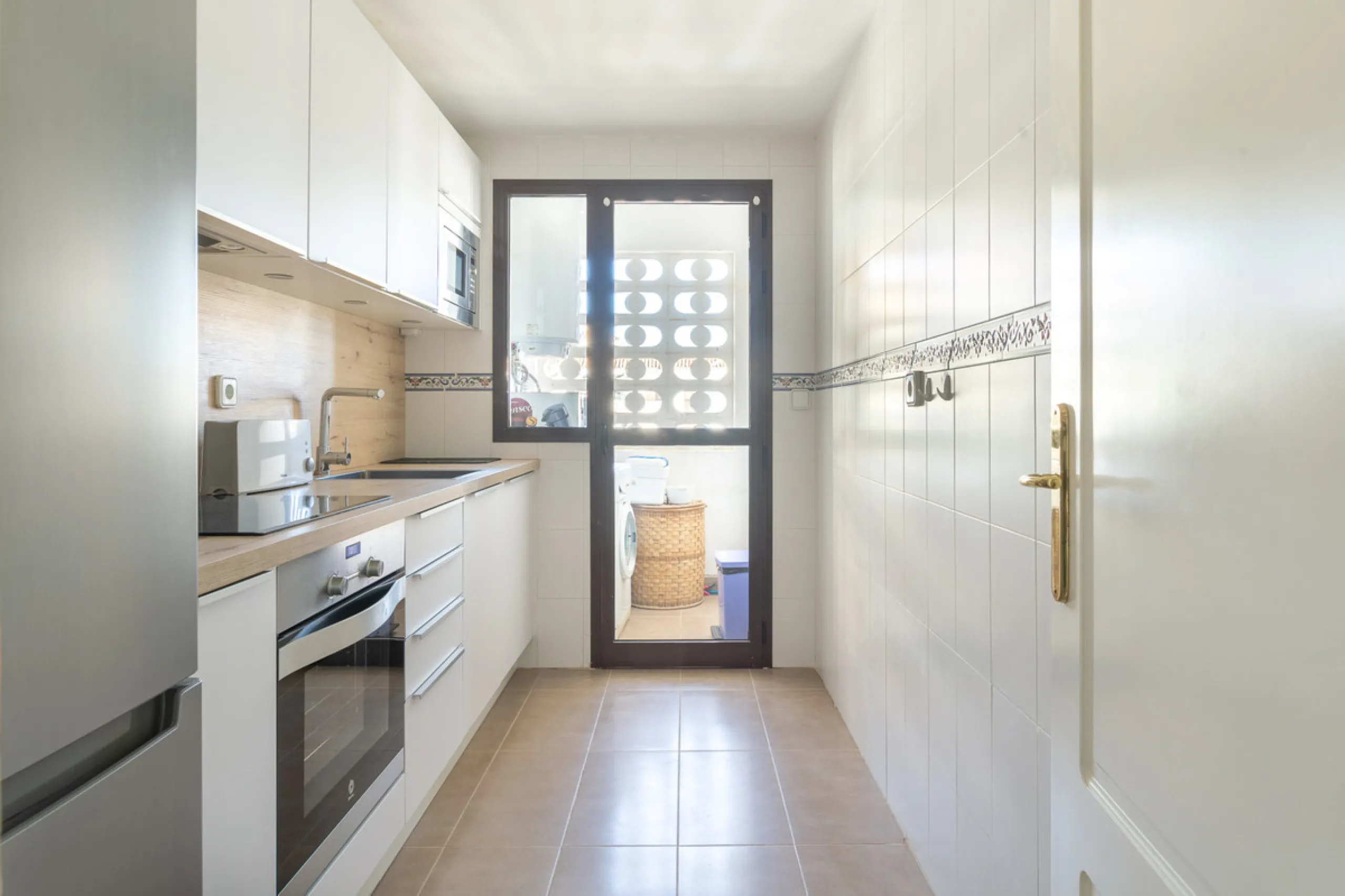 This exceptional two-bedroom, two-bathroom apartment is perfectly positioned on the front line of the beach in the sought-after area of Puerto La Duquesa, Manilva, Malaga. Offering a harmonious blend of comfort, style, and convenience, the property stands