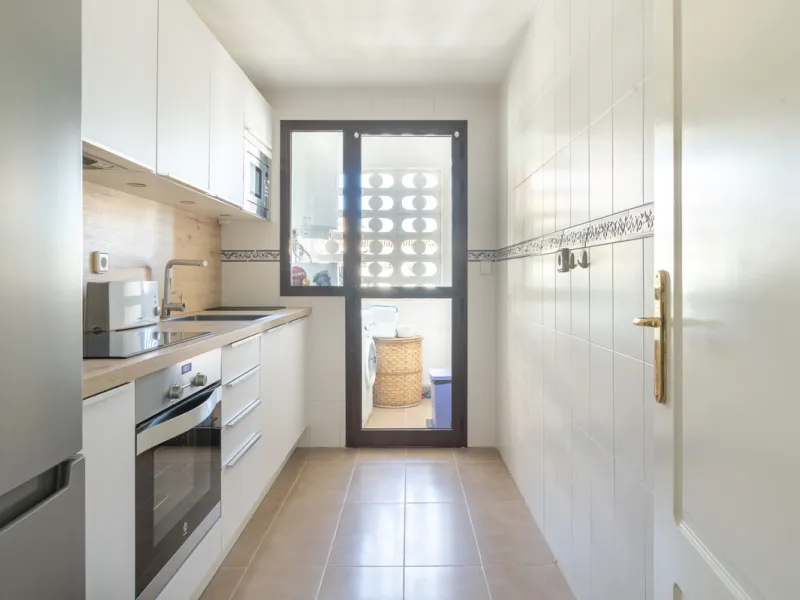 This exceptional two-bedroom, two-bathroom apartment is perfectly positioned on the front line of the beach in the sought-after area of Puerto La Duquesa, Manilva, Malaga. Offering a harmonious blend of comfort, style, and convenience, the property stands