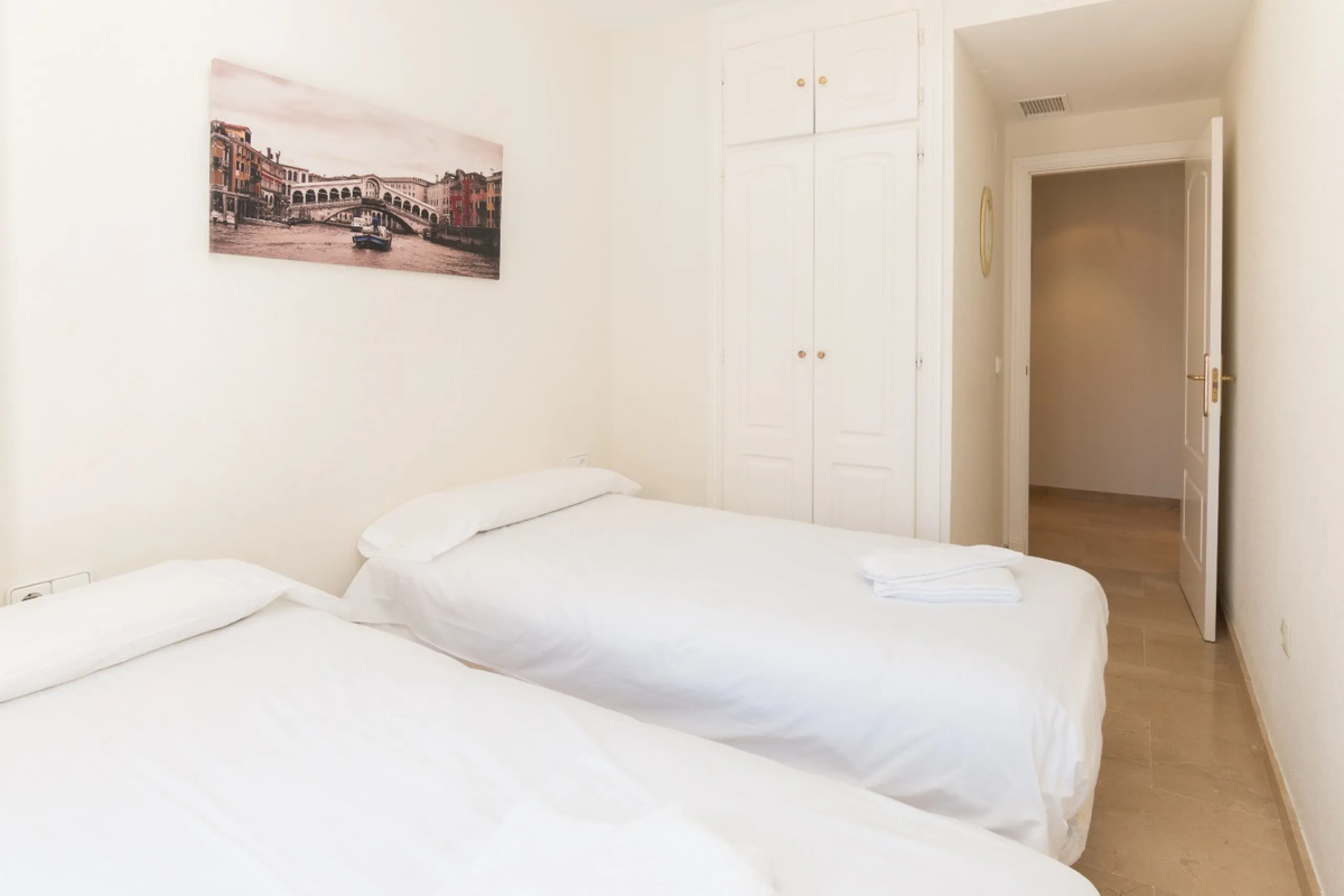 This exceptional two-bedroom, two-bathroom apartment is perfectly positioned on the front line of the beach in the sought-after area of Puerto La Duquesa, Manilva, Malaga. Offering a harmonious blend of comfort, style, and convenience, the property stands