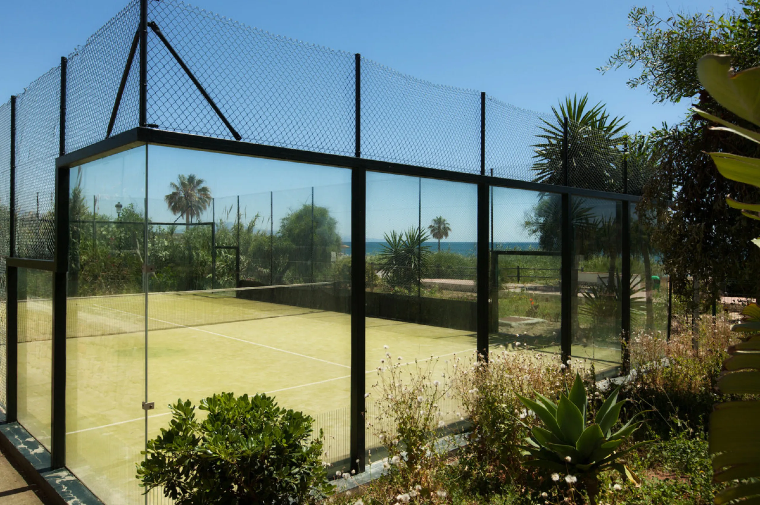 This exceptional two-bedroom, two-bathroom apartment is perfectly positioned on the front line of the beach in the sought-after area of Puerto La Duquesa, Manilva, Malaga. Offering a harmonious blend of comfort, style, and convenience, the property stands