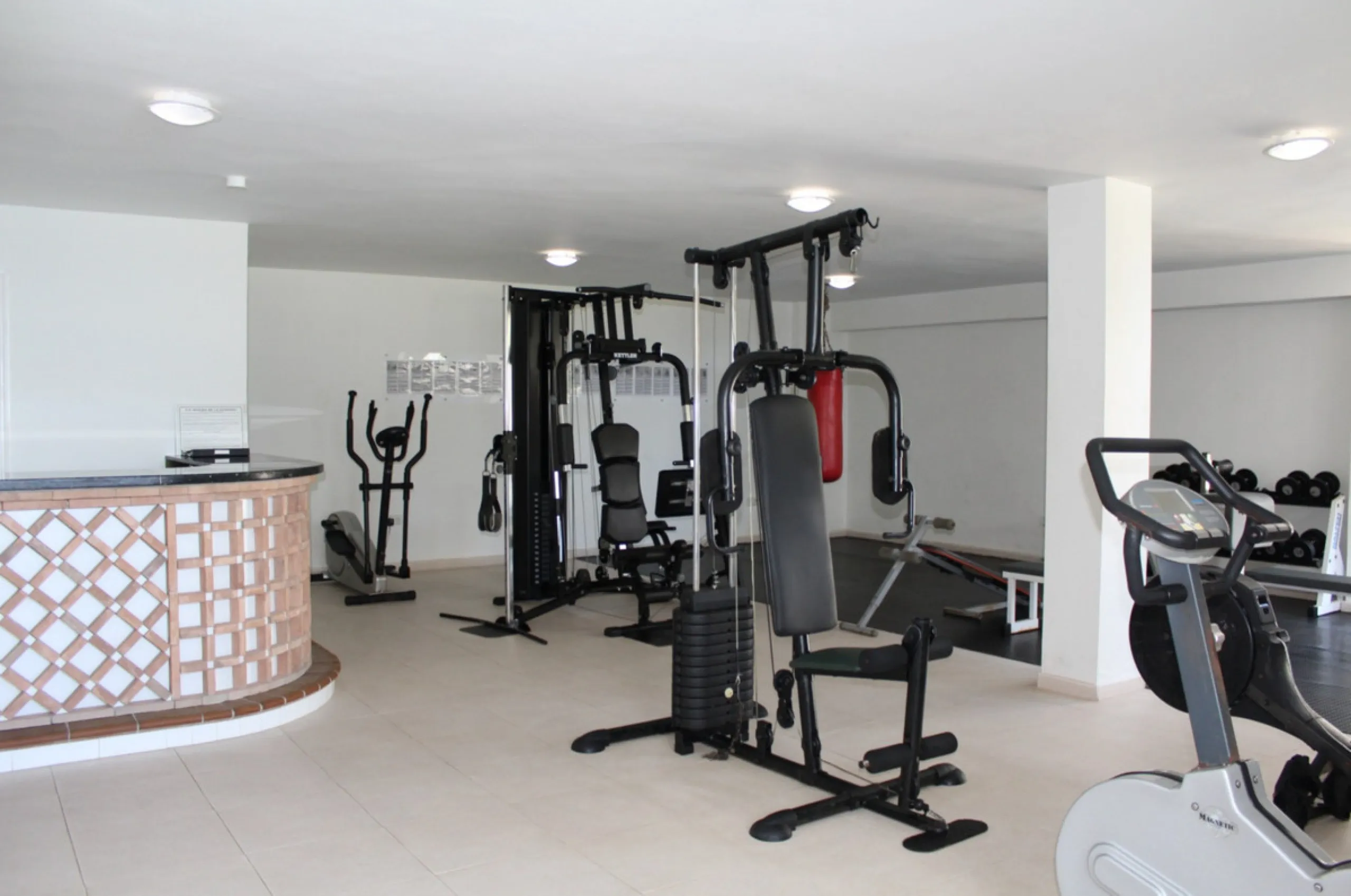 This exceptional two-bedroom, two-bathroom apartment is perfectly positioned on the front line of the beach in the sought-after area of Puerto La Duquesa, Manilva, Malaga. Offering a harmonious blend of comfort, style, and convenience, the property stands