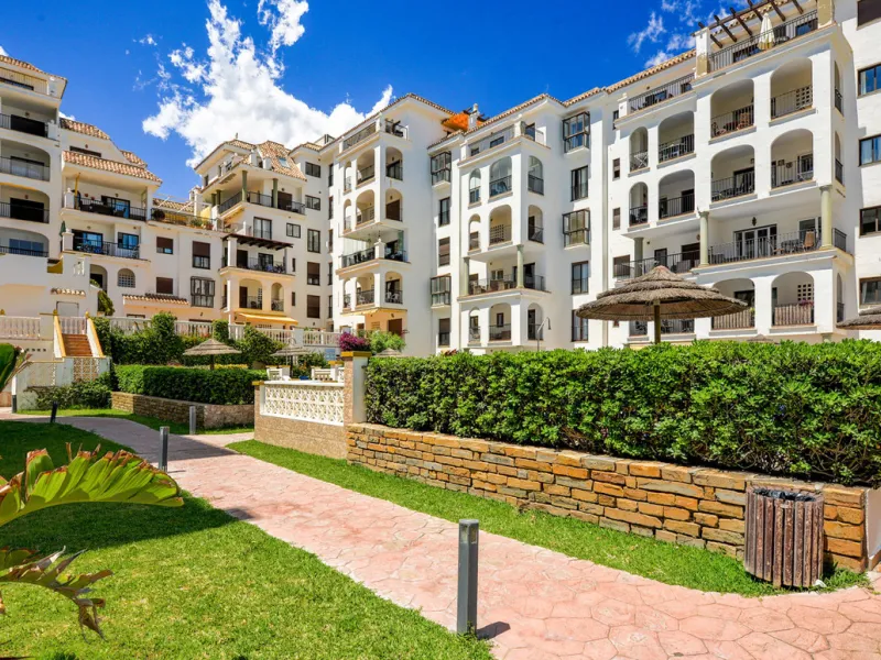 This exceptional two-bedroom, two-bathroom apartment is perfectly positioned on the front line of the beach in the sought-after area of Puerto La Duquesa, Manilva, Malaga. Offering a harmonious blend of comfort, style, and convenience, the property stands