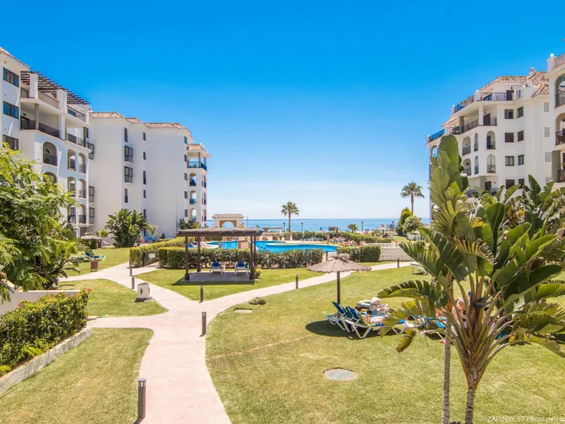 This exceptional two-bedroom, two-bathroom apartment is perfectly positioned on the front line of the beach in the sought-after area of Puerto La Duquesa, Manilva, Malaga. Offering a harmonious blend of comfort, style, and convenience, the property stands