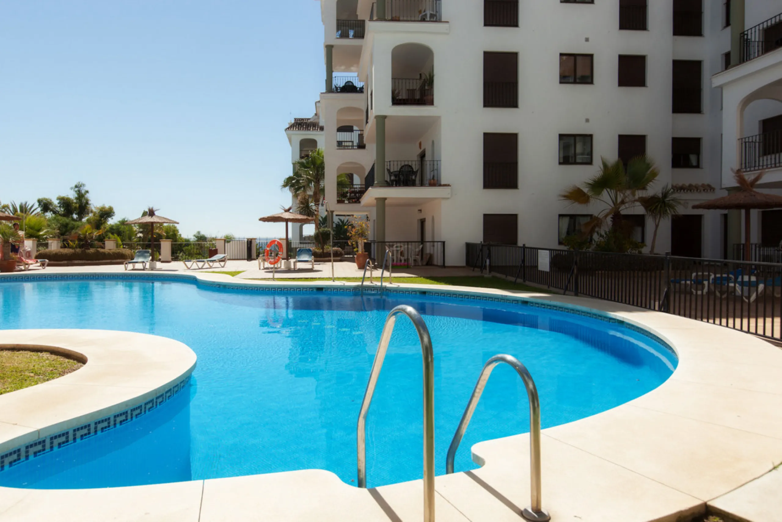 This exceptional two-bedroom, two-bathroom apartment is perfectly positioned on the front line of the beach in the sought-after area of Puerto La Duquesa, Manilva, Malaga. Offering a harmonious blend of comfort, style, and convenience, the property stands