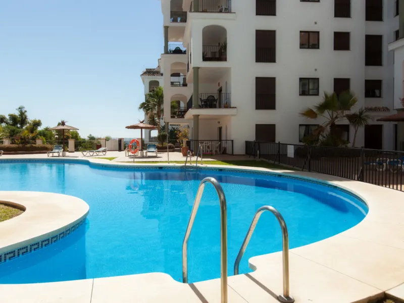 This exceptional two-bedroom, two-bathroom apartment is perfectly positioned on the front line of the beach in the sought-after area of Puerto La Duquesa, Manilva, Malaga. Offering a harmonious blend of comfort, style, and convenience, the property stands