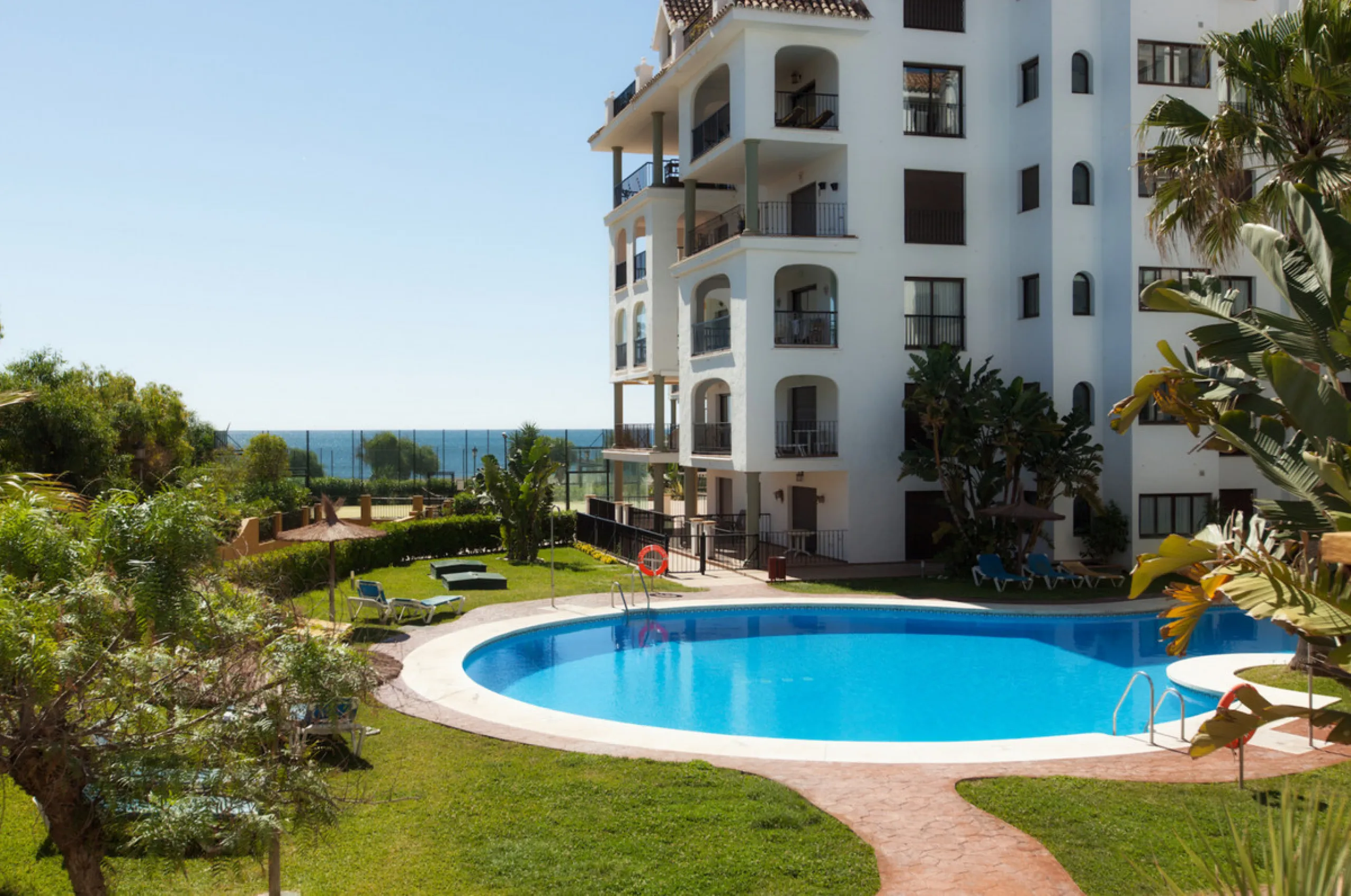 This exceptional two-bedroom, two-bathroom apartment is perfectly positioned on the front line of the beach in the sought-after area of Puerto La Duquesa, Manilva, Malaga. Offering a harmonious blend of comfort, style, and convenience, the property stands