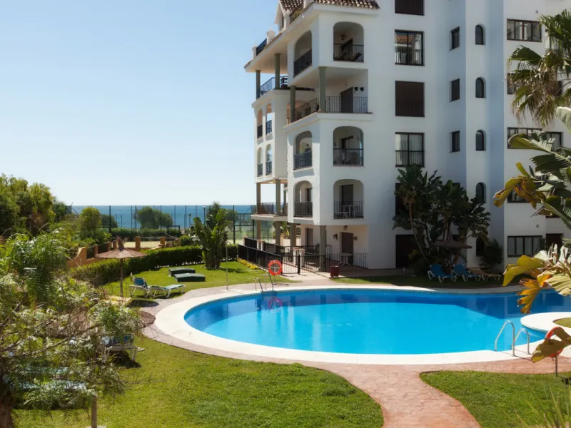 This exceptional two-bedroom, two-bathroom apartment is perfectly positioned on the front line of the beach in the sought-after area of Puerto La Duquesa, Manilva, Malaga. Offering a harmonious blend of comfort, style, and convenience, the property stands