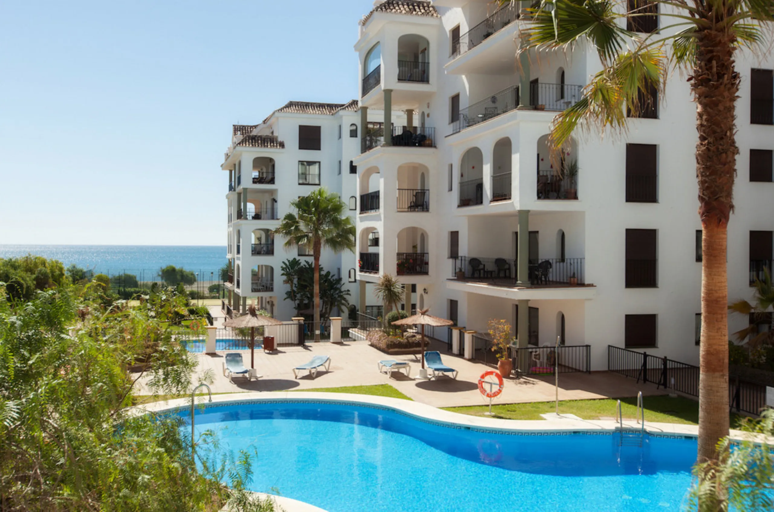 This exceptional two-bedroom, two-bathroom apartment is perfectly positioned on the front line of the beach in the sought-after area of Puerto La Duquesa, Manilva, Malaga. Offering a harmonious blend of comfort, style, and convenience, the property stands