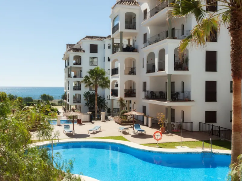This exceptional two-bedroom, two-bathroom apartment is perfectly positioned on the front line of the beach in the sought-after area of Puerto La Duquesa, Manilva, Malaga. Offering a harmonious blend of comfort, style, and convenience, the property stands