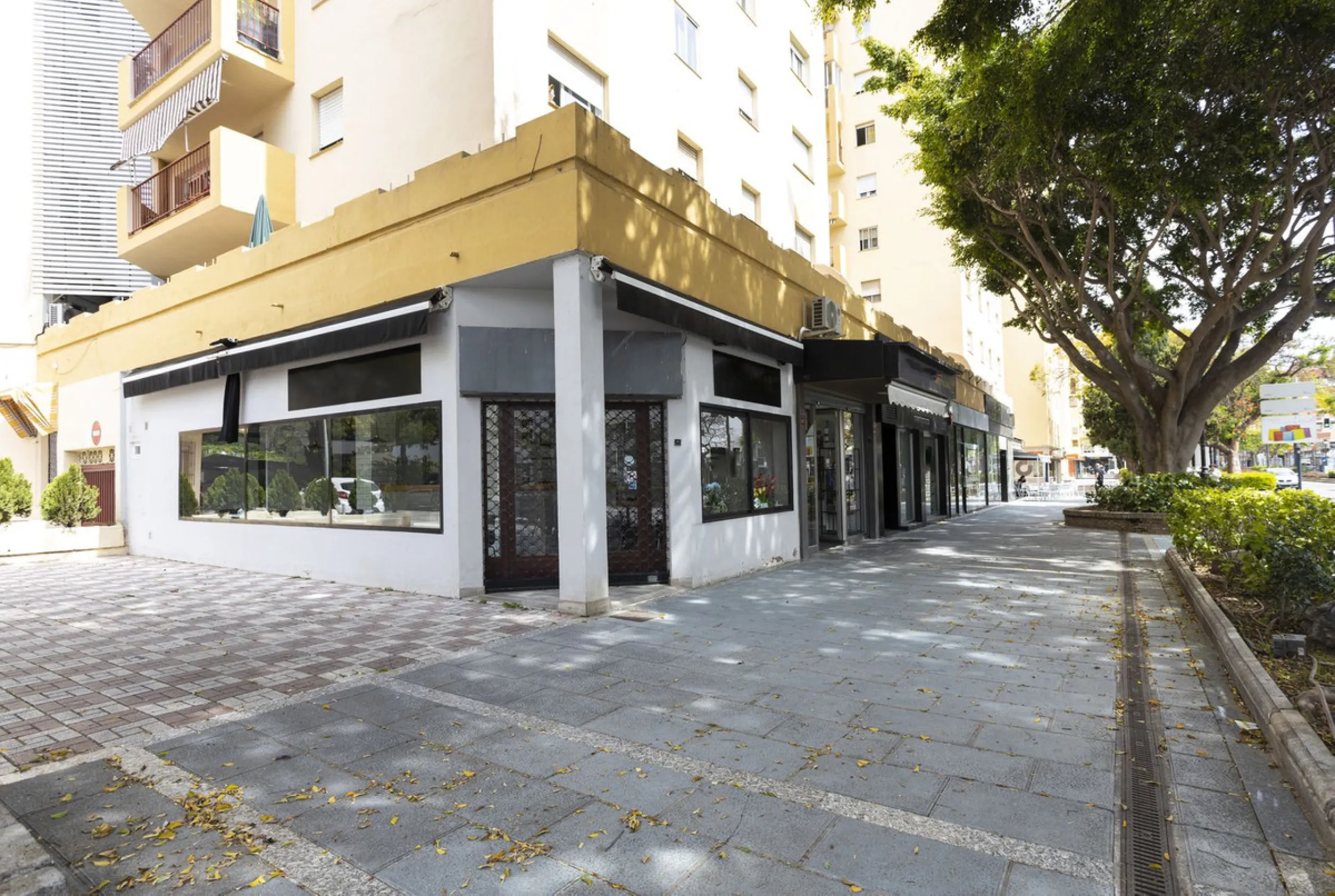 This commercial property is a gem in the heart of Marbella's bustling city center. Boasting two spacious floors, it offers ample room for both storage and office space, making it a prime location for a variety of businesses. The property's standout featur
