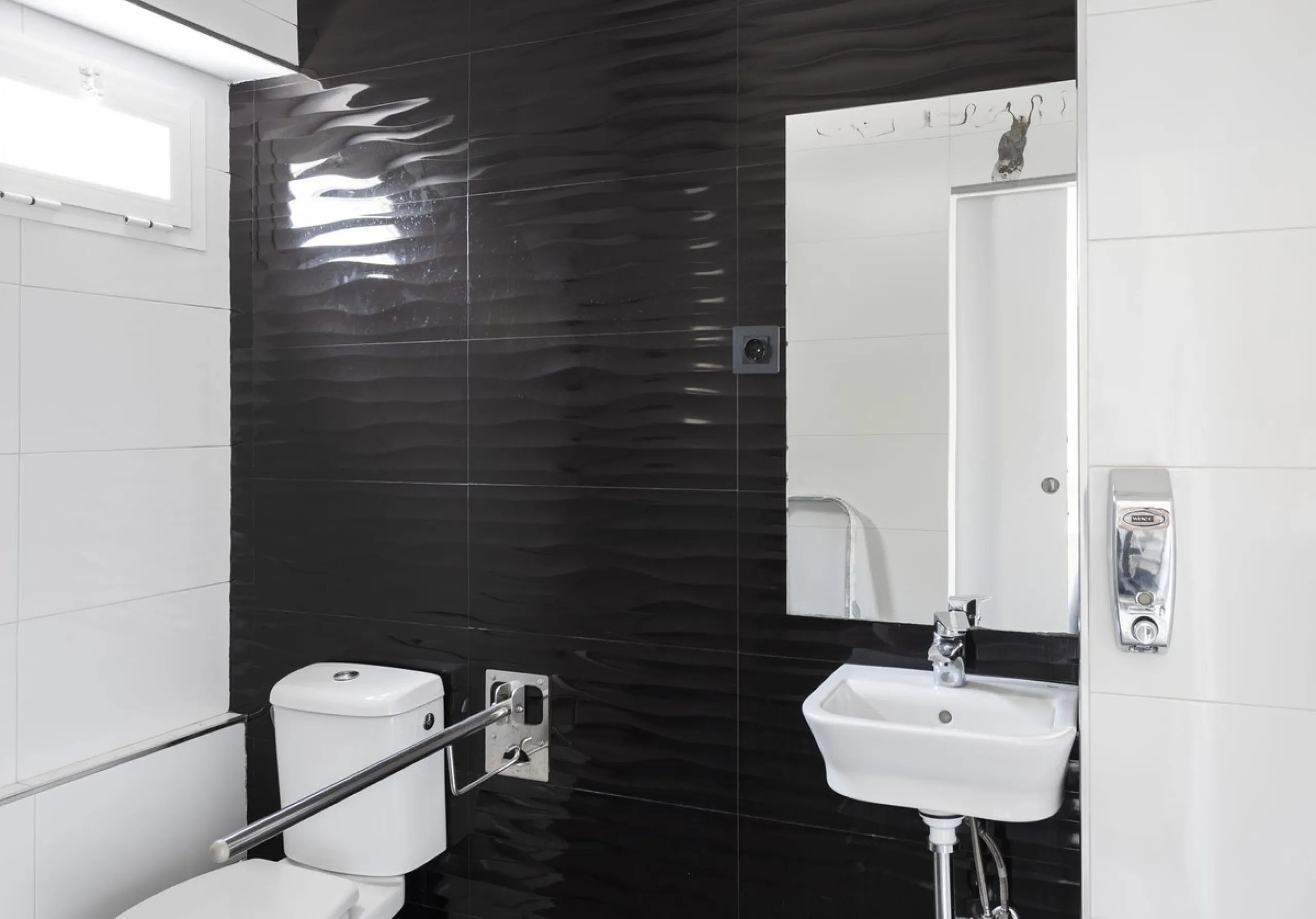 This commercial property is a gem in the heart of Marbella's bustling city center. Boasting two spacious floors, it offers ample room for both storage and office space, making it a prime location for a variety of businesses. The property's standout featur