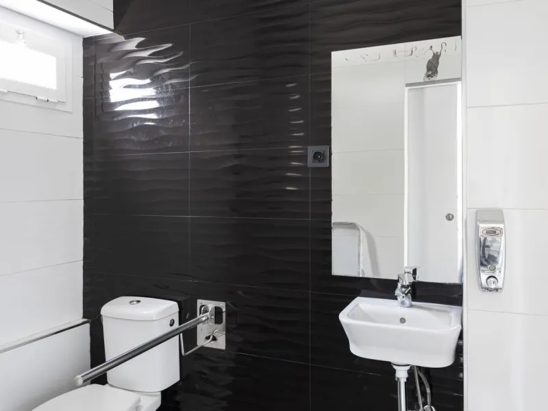 This commercial property is a gem in the heart of Marbella's bustling city center. Boasting two spacious floors, it offers ample room for both storage and office space, making it a prime location for a variety of businesses. The property's standout featur