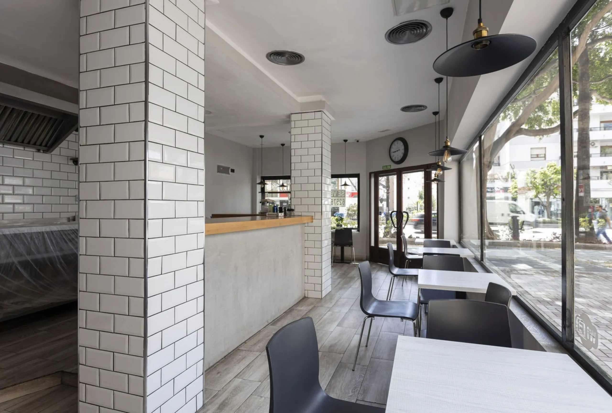 This commercial property is a gem in the heart of Marbella's bustling city center. Boasting two spacious floors, it offers ample room for both storage and office space, making it a prime location for a variety of businesses. The property's standout featur