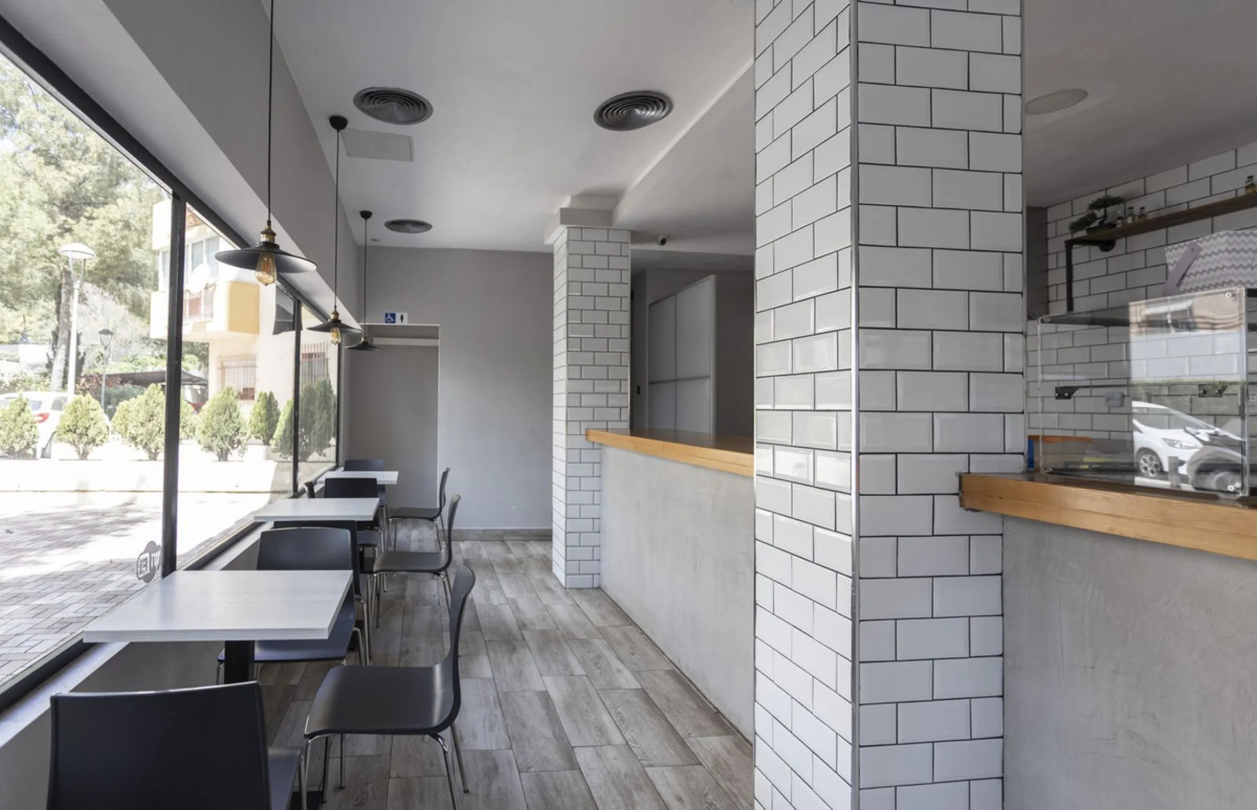 This commercial property is a gem in the heart of Marbella's bustling city center. Boasting two spacious floors, it offers ample room for both storage and office space, making it a prime location for a variety of businesses. The property's standout featur