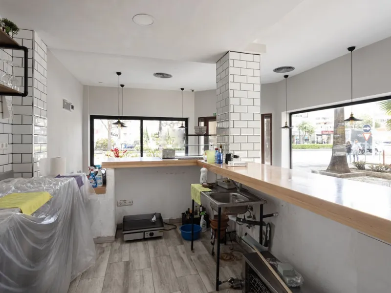 This commercial property is a gem in the heart of Marbella's bustling city center. Boasting two spacious floors, it offers ample room for both storage and office space, making it a prime location for a variety of businesses. The property's standout featur