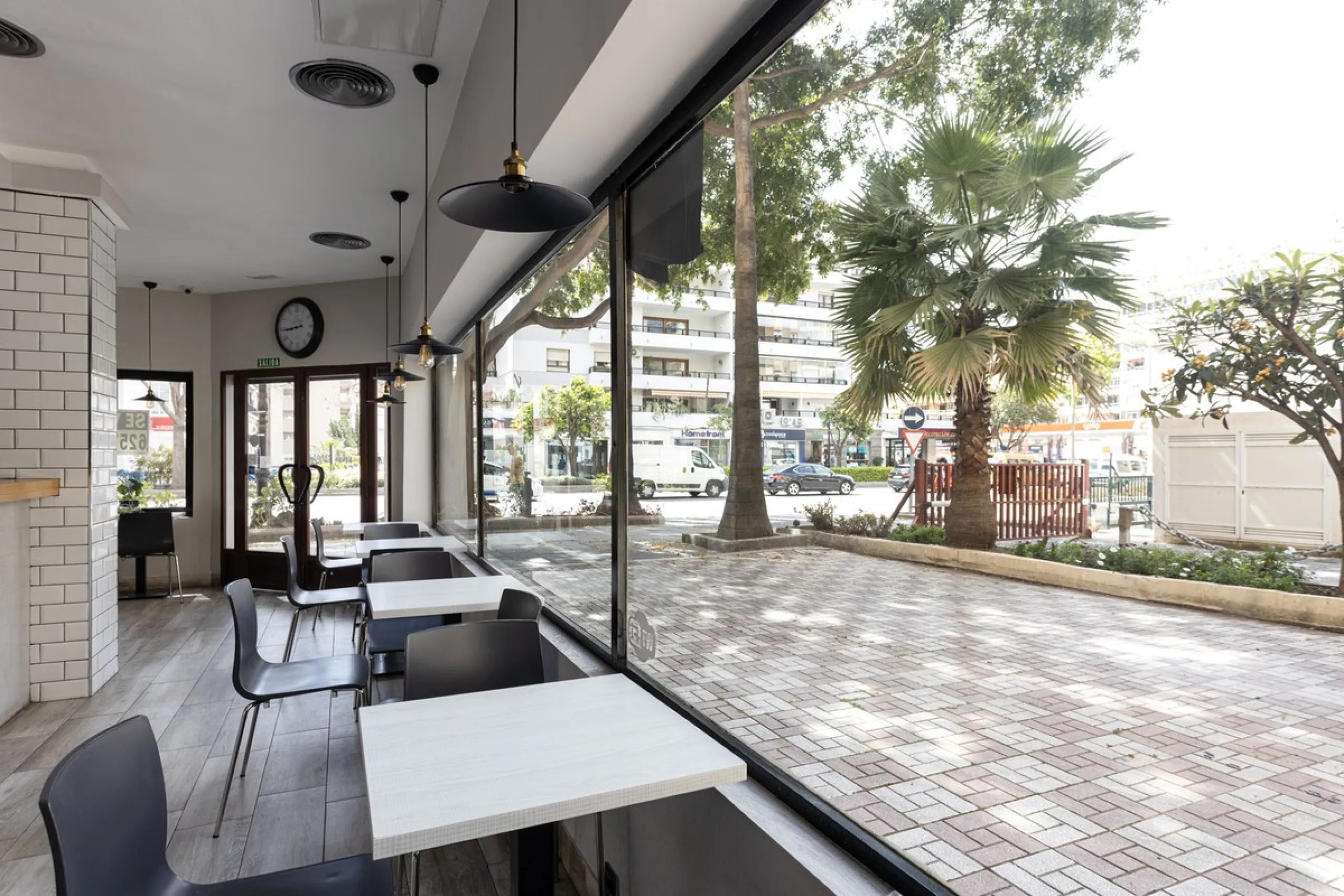 This commercial property is a gem in the heart of Marbella's bustling city center. Boasting two spacious floors, it offers ample room for both storage and office space, making it a prime location for a variety of businesses. The property's standout featur