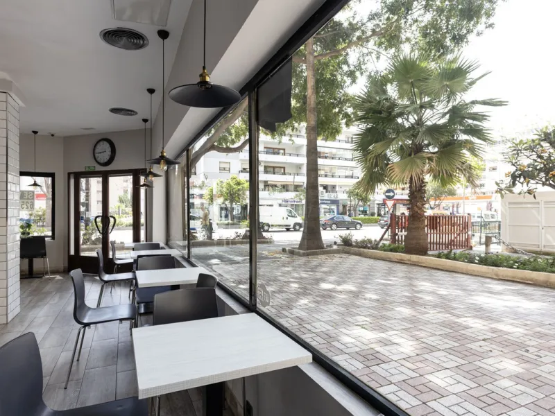 This commercial property is a gem in the heart of Marbella's bustling city center. Boasting two spacious floors, it offers ample room for both storage and office space, making it a prime location for a variety of businesses. The property's standout featur