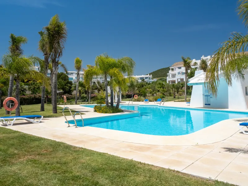 Located within one of the most sought-after developments on the Costa del Sol, this stylish ground floor apartment offers an exceptional living environment, combining comfort, nature, and a true resort lifestyle.