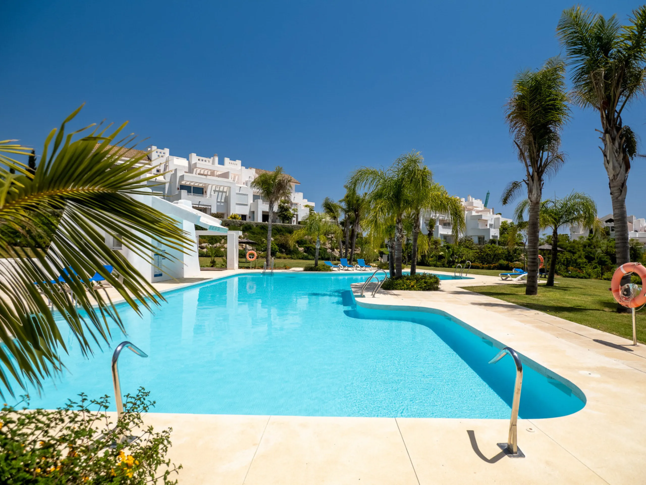 Located within one of the most sought-after developments on the Costa del Sol, this stylish ground floor apartment offers an exceptional living environment, combining comfort, nature, and a true resort lifestyle.