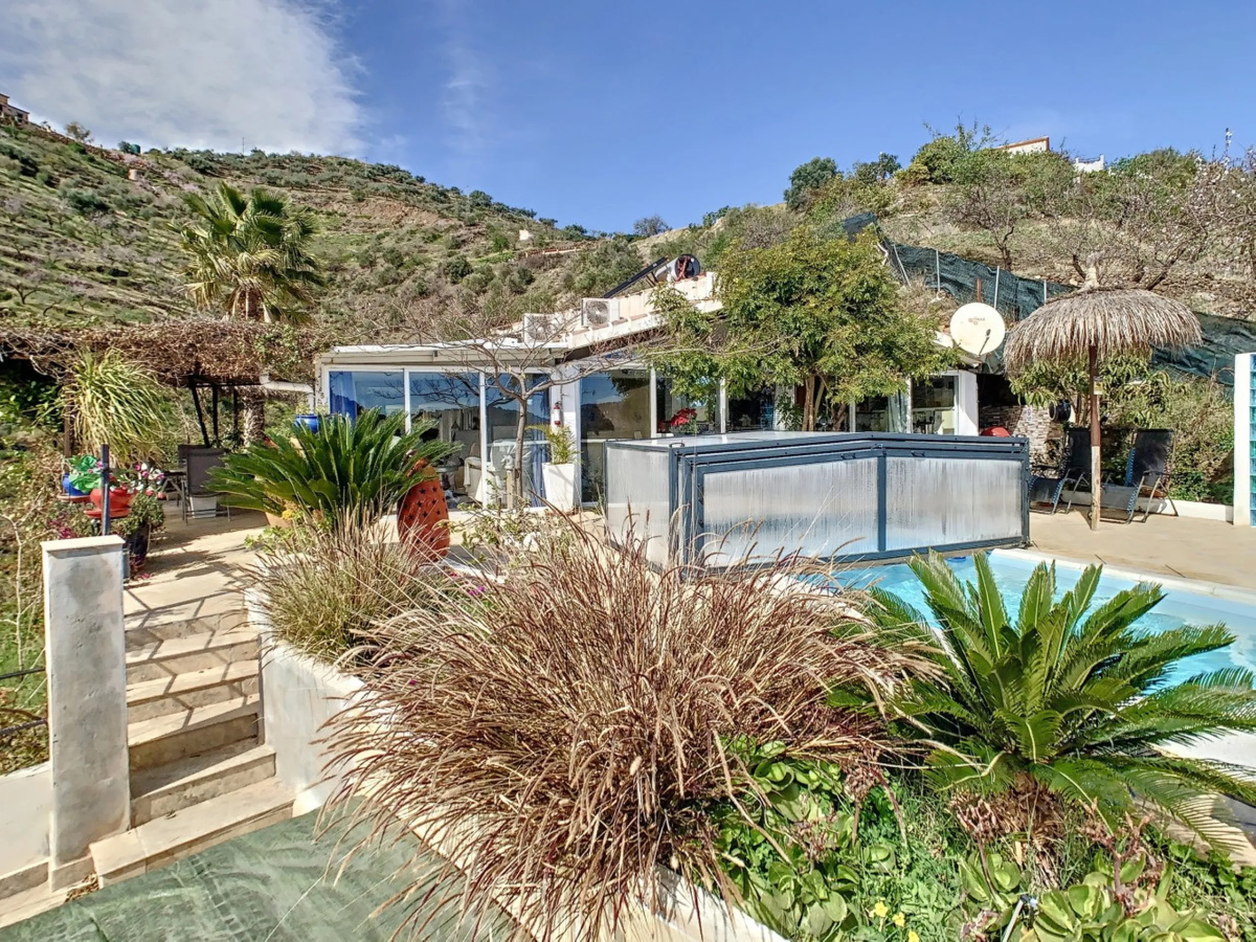 You are looking for a large villa with a heated swimming pool, neatly hidden nearly at the top of a mountain, surrounded by nature with breath-taking views of the valley up to the sea and the village of Arenas? This might just be what you are looking for.