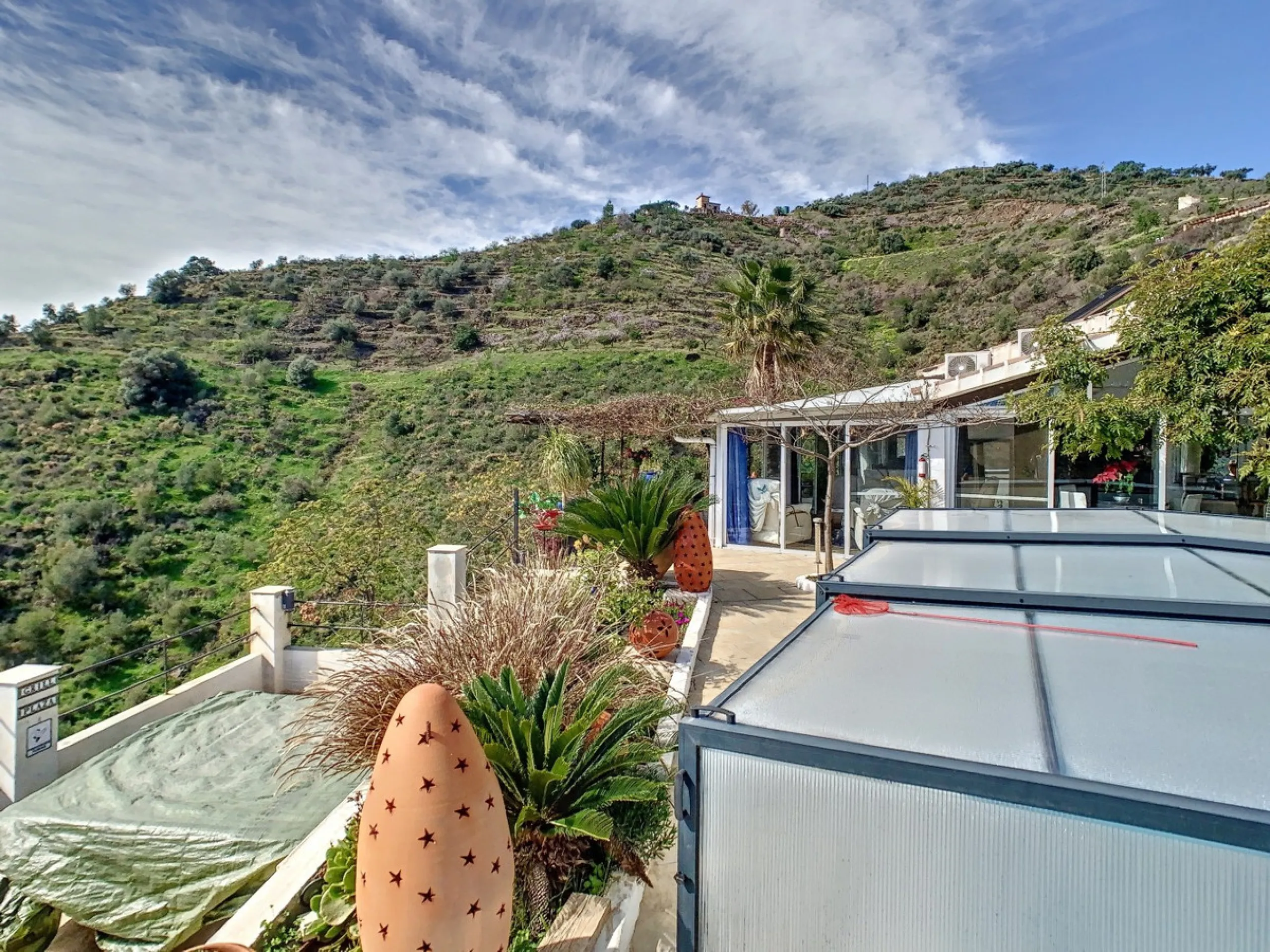 You are looking for a large villa with a heated swimming pool, neatly hidden nearly at the top of a mountain, surrounded by nature with breath-taking views of the valley up to the sea and the village of Arenas? This might just be what you are looking for.
