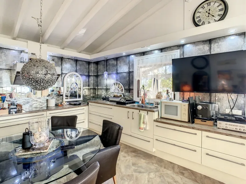 You are looking for a large villa with a heated swimming pool, neatly hidden nearly at the top of a mountain, surrounded by nature with breath-taking views of the valley up to the sea and the village of Arenas? This might just be what you are looking for.