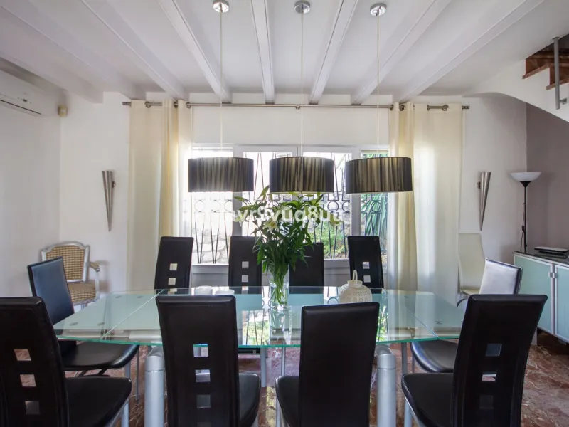 This property is stunning! Set in the heart of Mijas Costa, in the desirable Campo Mijas area. From the private entrance there is a driveway and garage, with steps down into the main entrance. This floor has a very spacious lounge area, with a great recep