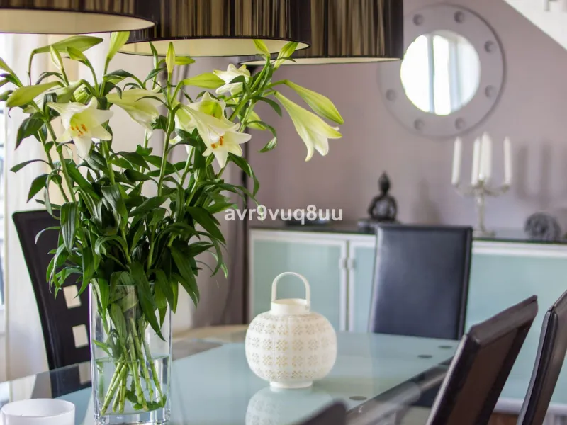 This property is stunning! Set in the heart of Mijas Costa, in the desirable Campo Mijas area. From the private entrance there is a driveway and garage, with steps down into the main entrance. This floor has a very spacious lounge area, with a great recep