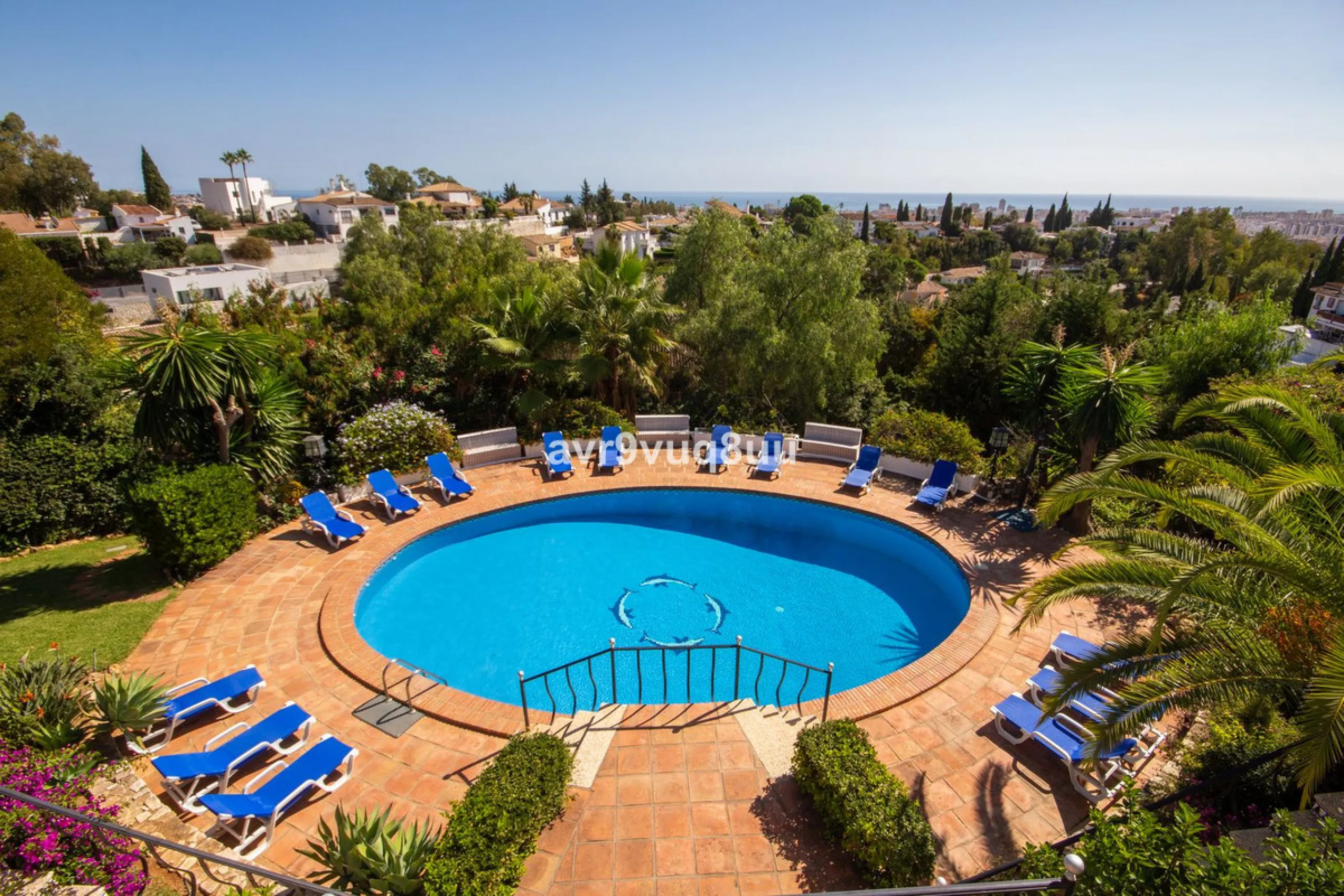 This property is stunning! Set in the heart of Mijas Costa, in the desirable Campo Mijas area. From the private entrance there is a driveway and garage, with steps down into the main entrance. This floor has a very spacious lounge area, with a great recep