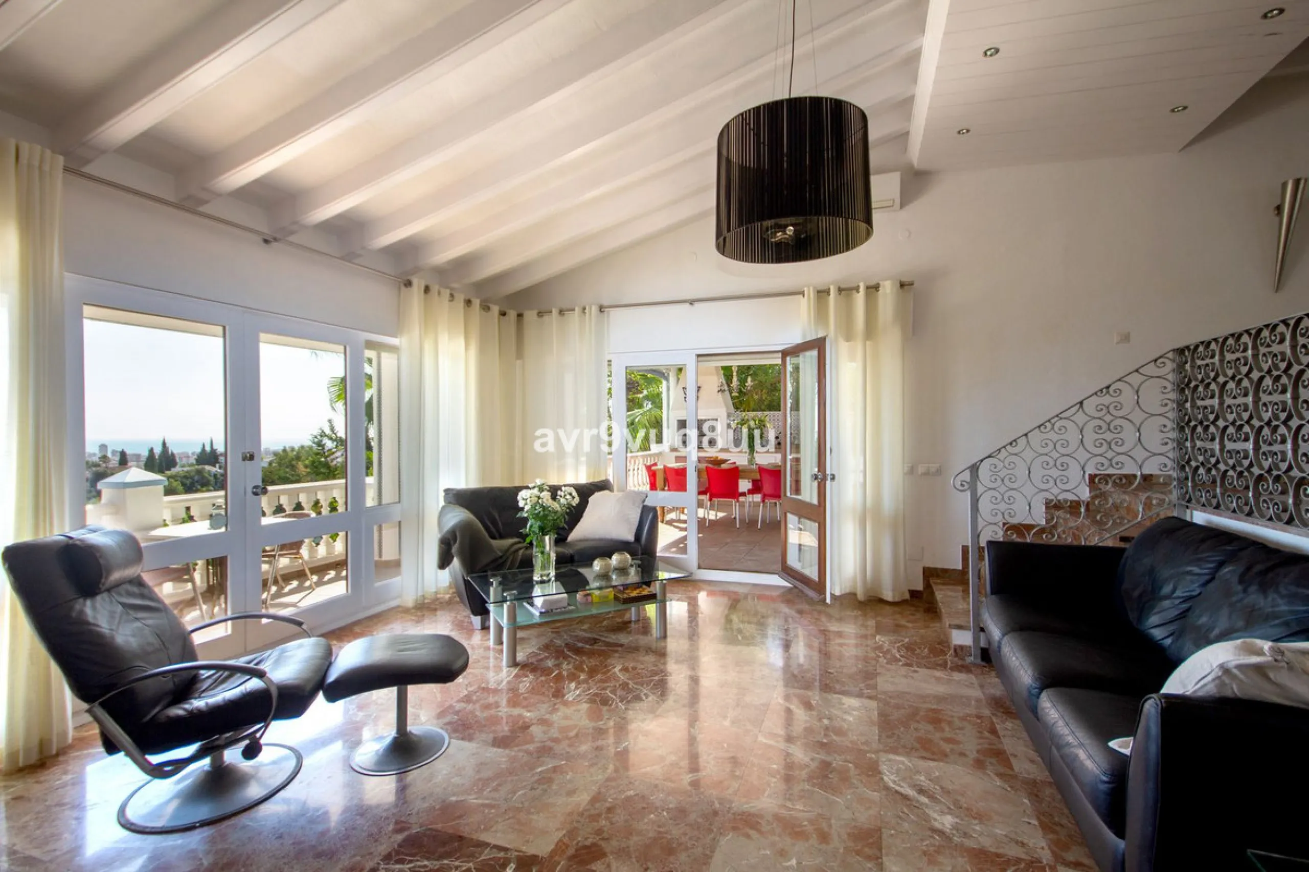 This property is stunning! Set in the heart of Mijas Costa, in the desirable Campo Mijas area. From the private entrance there is a driveway and garage, with steps down into the main entrance. This floor has a very spacious lounge area, with a great recep