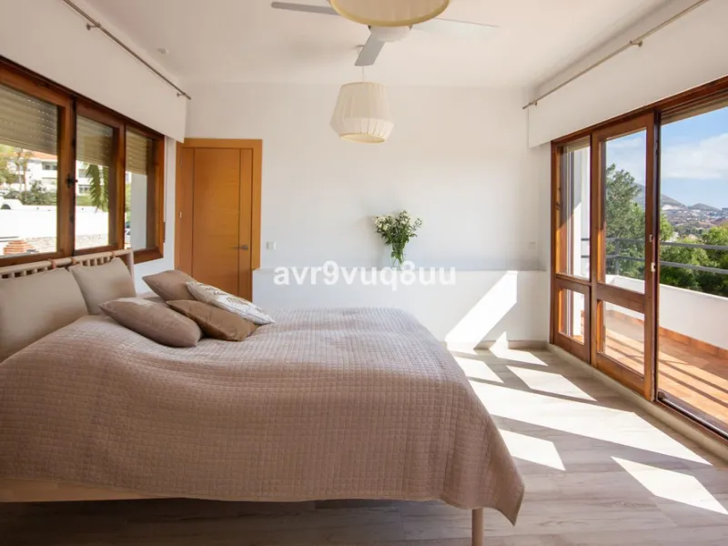 This property is stunning! Set in the heart of Mijas Costa, in the desirable Campo Mijas area. From the private entrance there is a driveway and garage, with steps down into the main entrance. This floor has a very spacious lounge area, with a great recep