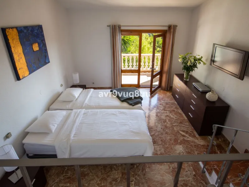This property is stunning! Set in the heart of Mijas Costa, in the desirable Campo Mijas area. From the private entrance there is a driveway and garage, with steps down into the main entrance. This floor has a very spacious lounge area, with a great recep