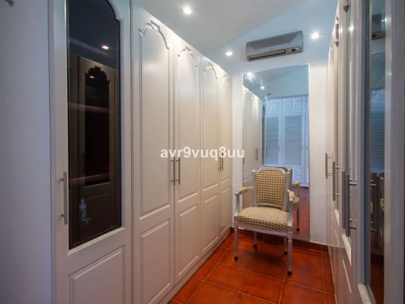 This property is stunning! Set in the heart of Mijas Costa, in the desirable Campo Mijas area. From the private entrance there is a driveway and garage, with steps down into the main entrance. This floor has a very spacious lounge area, with a great recep