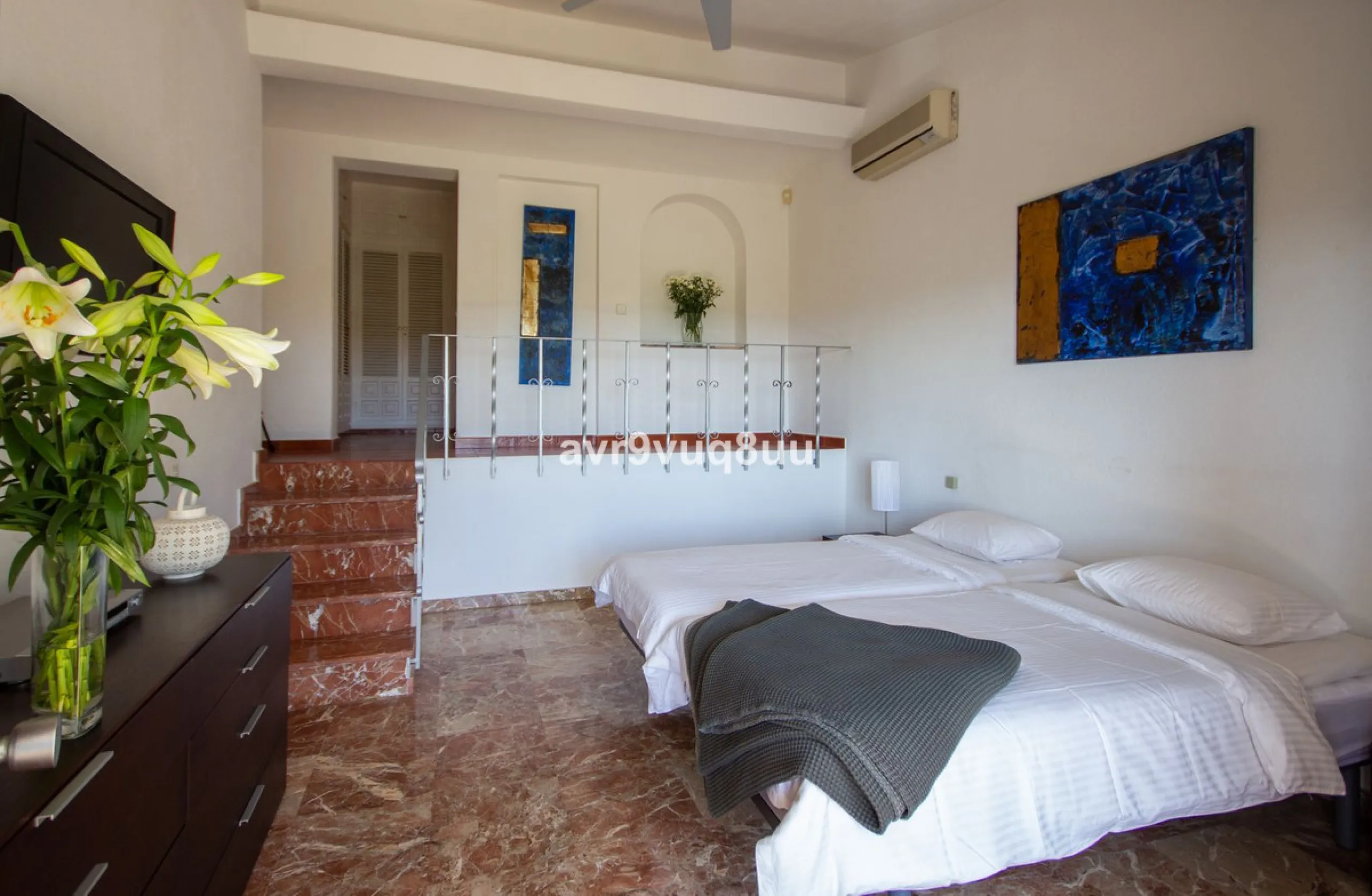 This property is stunning! Set in the heart of Mijas Costa, in the desirable Campo Mijas area. From the private entrance there is a driveway and garage, with steps down into the main entrance. This floor has a very spacious lounge area, with a great recep