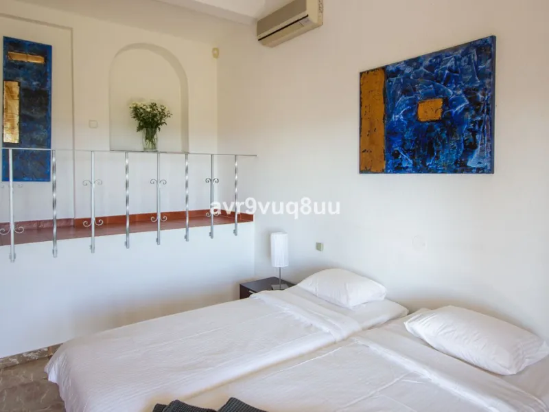 This property is stunning! Set in the heart of Mijas Costa, in the desirable Campo Mijas area. From the private entrance there is a driveway and garage, with steps down into the main entrance. This floor has a very spacious lounge area, with a great recep