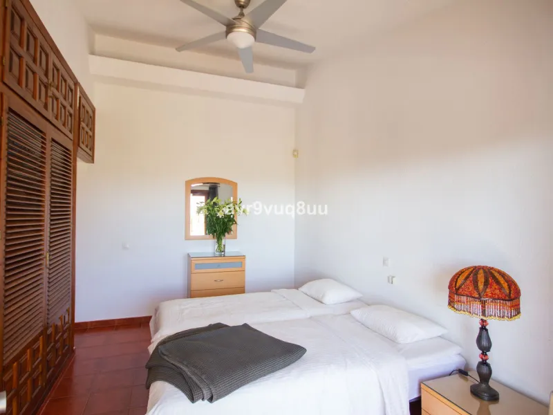 This property is stunning! Set in the heart of Mijas Costa, in the desirable Campo Mijas area. From the private entrance there is a driveway and garage, with steps down into the main entrance. This floor has a very spacious lounge area, with a great recep