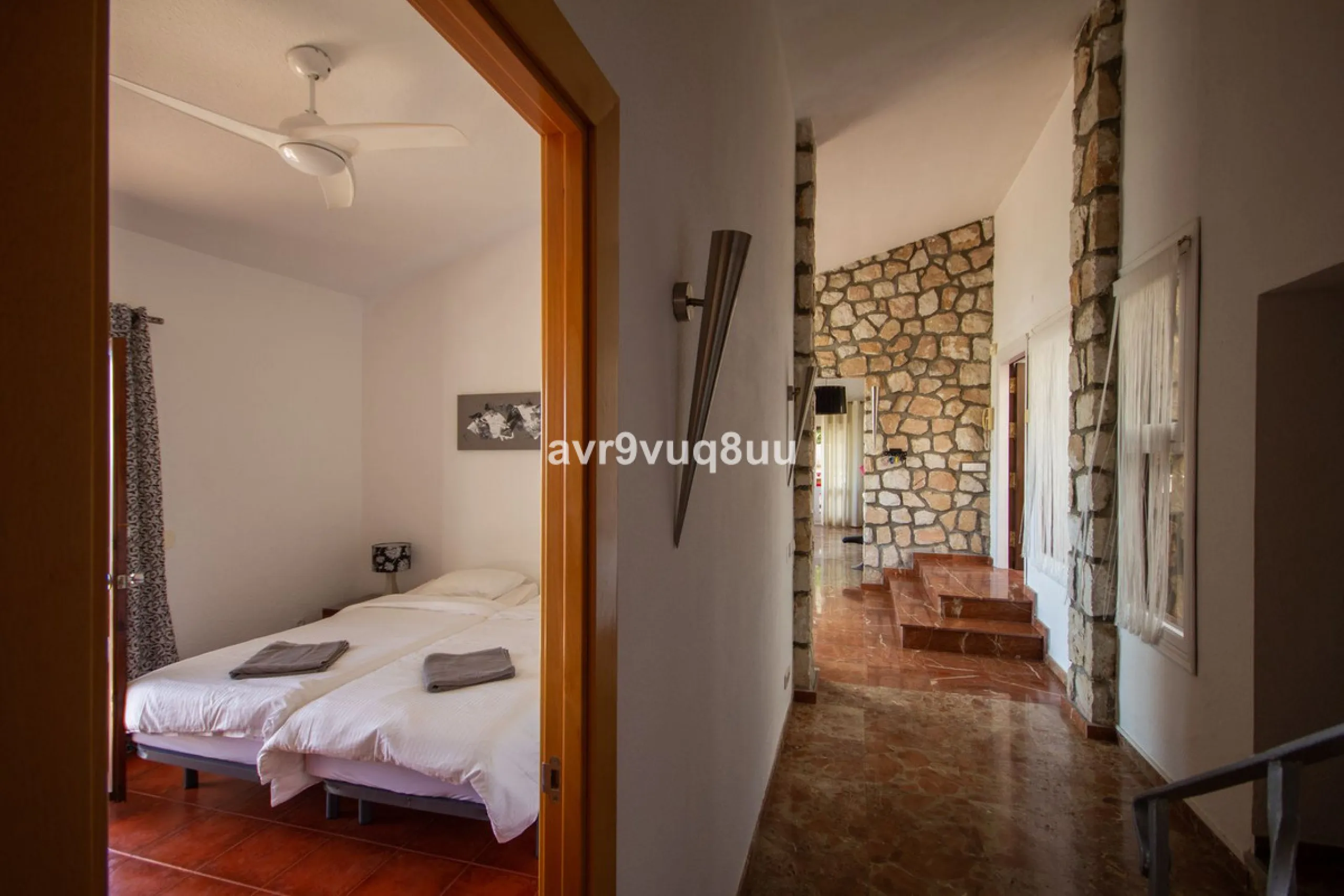 This property is stunning! Set in the heart of Mijas Costa, in the desirable Campo Mijas area. From the private entrance there is a driveway and garage, with steps down into the main entrance. This floor has a very spacious lounge area, with a great recep