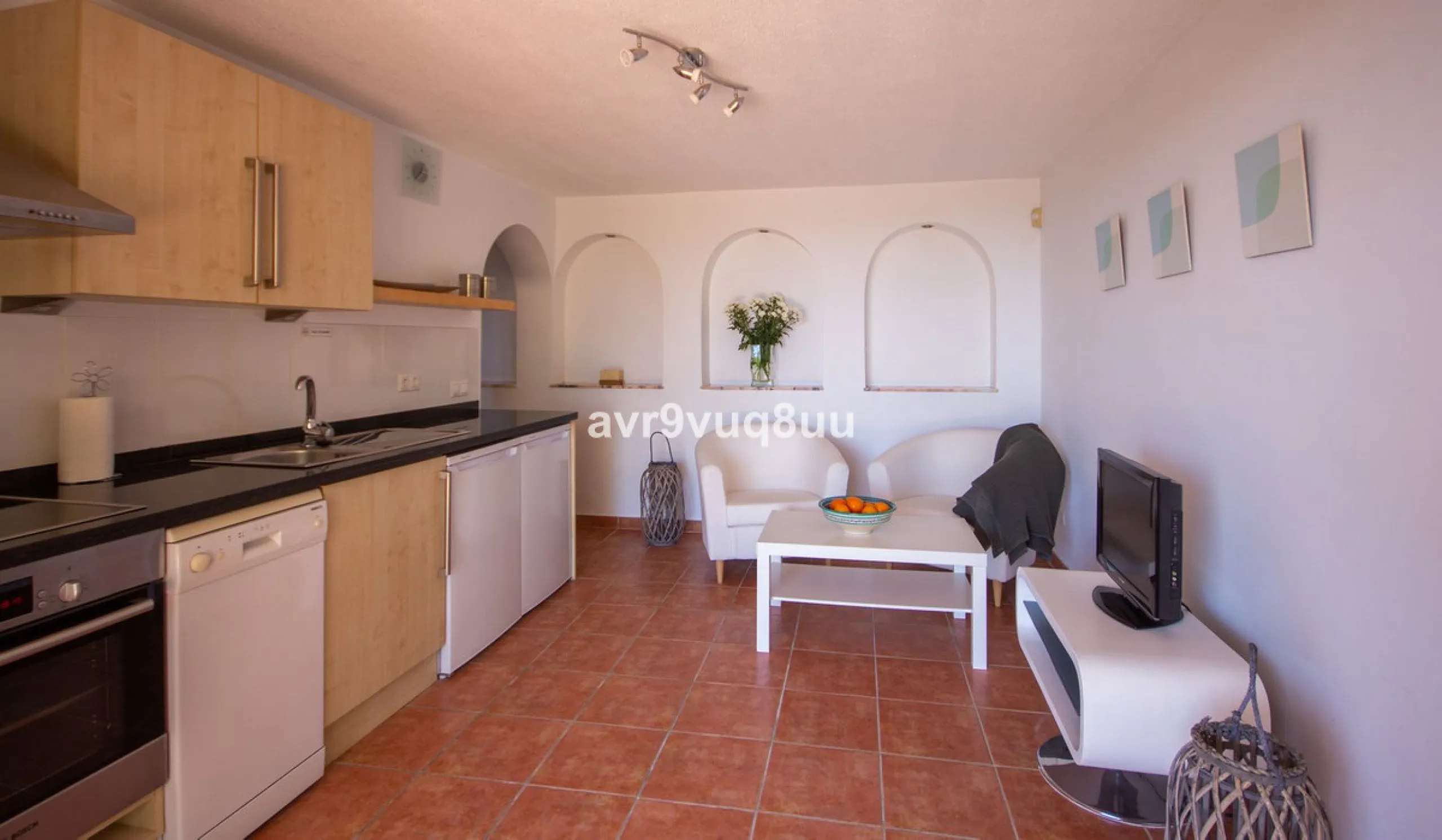 This property is stunning! Set in the heart of Mijas Costa, in the desirable Campo Mijas area. From the private entrance there is a driveway and garage, with steps down into the main entrance. This floor has a very spacious lounge area, with a great recep