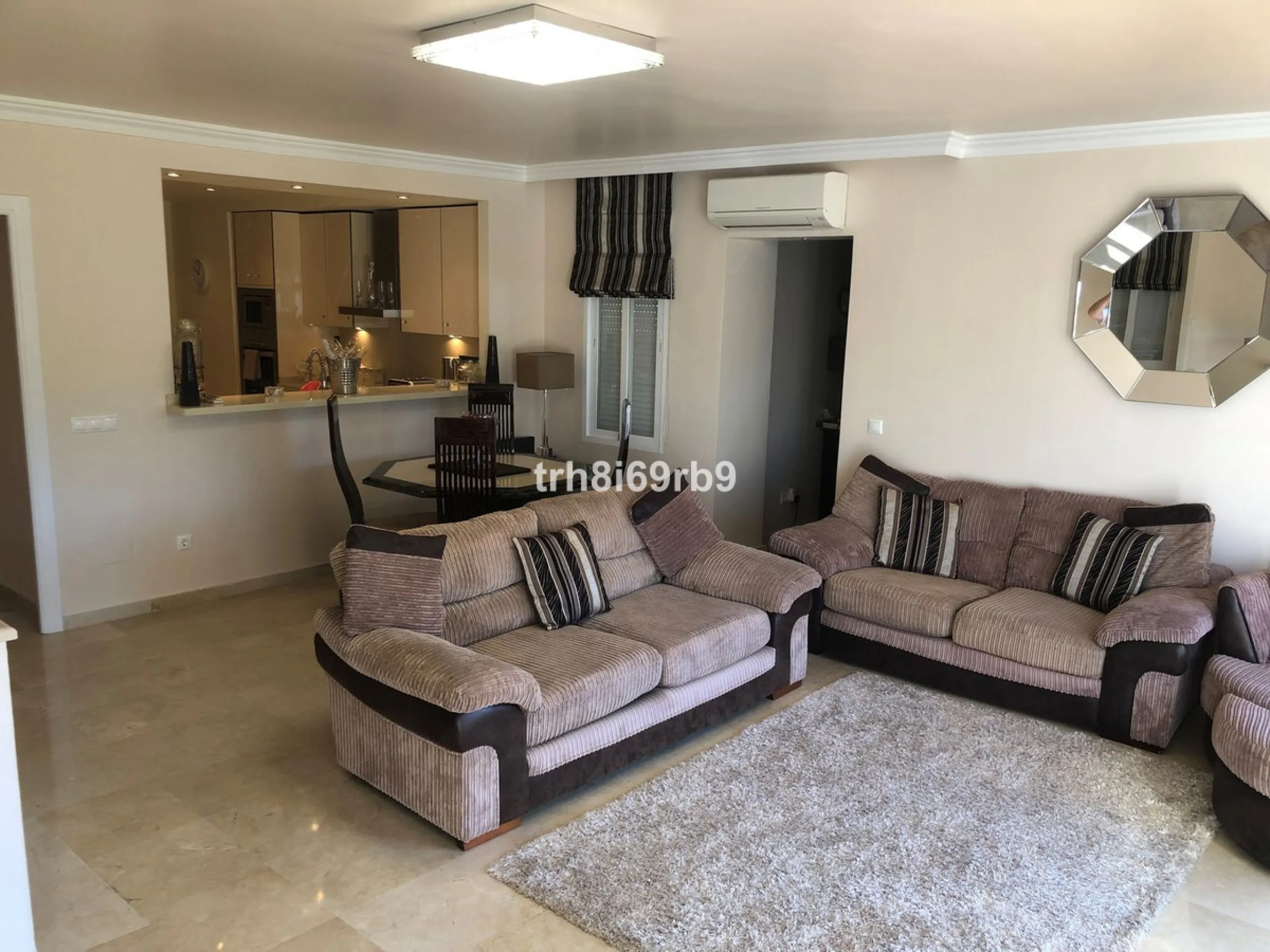 A lovely, spacious 3 bed, 3 bath detached villa, located in the very popular beach side community of Dos Hermanas. Dos Hermanas is very conveniently located on the beach side of the A7, on the New Golden Mile between Estepona and San Pedro and has perhaps