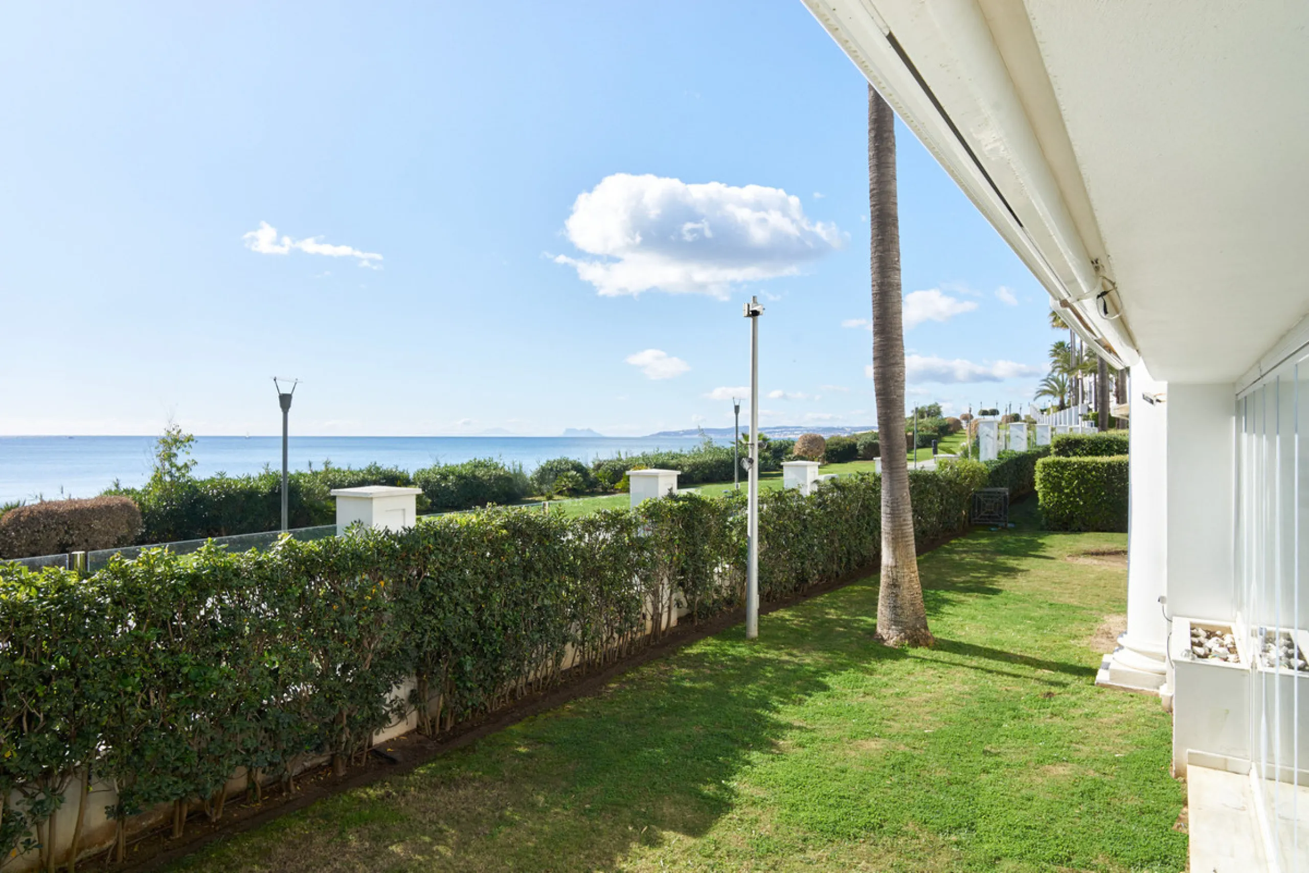 Situated in the prestigious Doncella Beach area, Estepona, this exquisite ground floor apartment offers an unparalleled blend of luxury and convenience. Boasting a prime front-line beach location, the property provides direct access to the sea and is with
