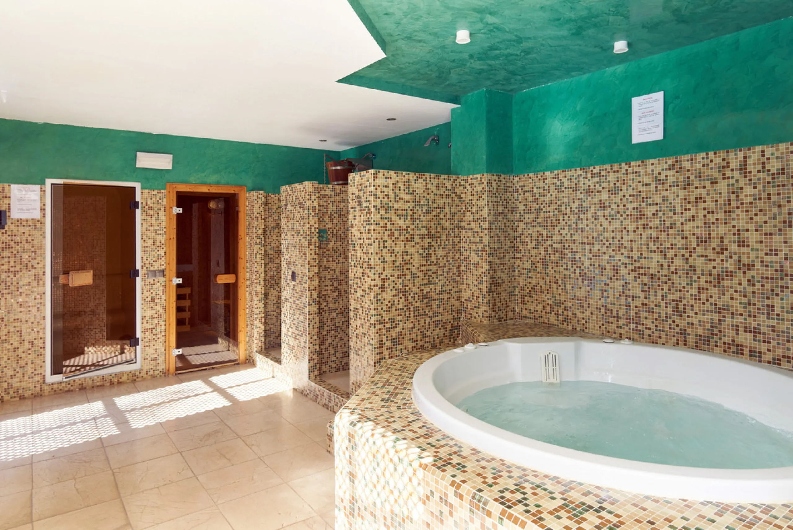 Situated in the prestigious Doncella Beach area, Estepona, this exquisite ground floor apartment offers an unparalleled blend of luxury and convenience. Boasting a prime front-line beach location, the property provides direct access to the sea and is with