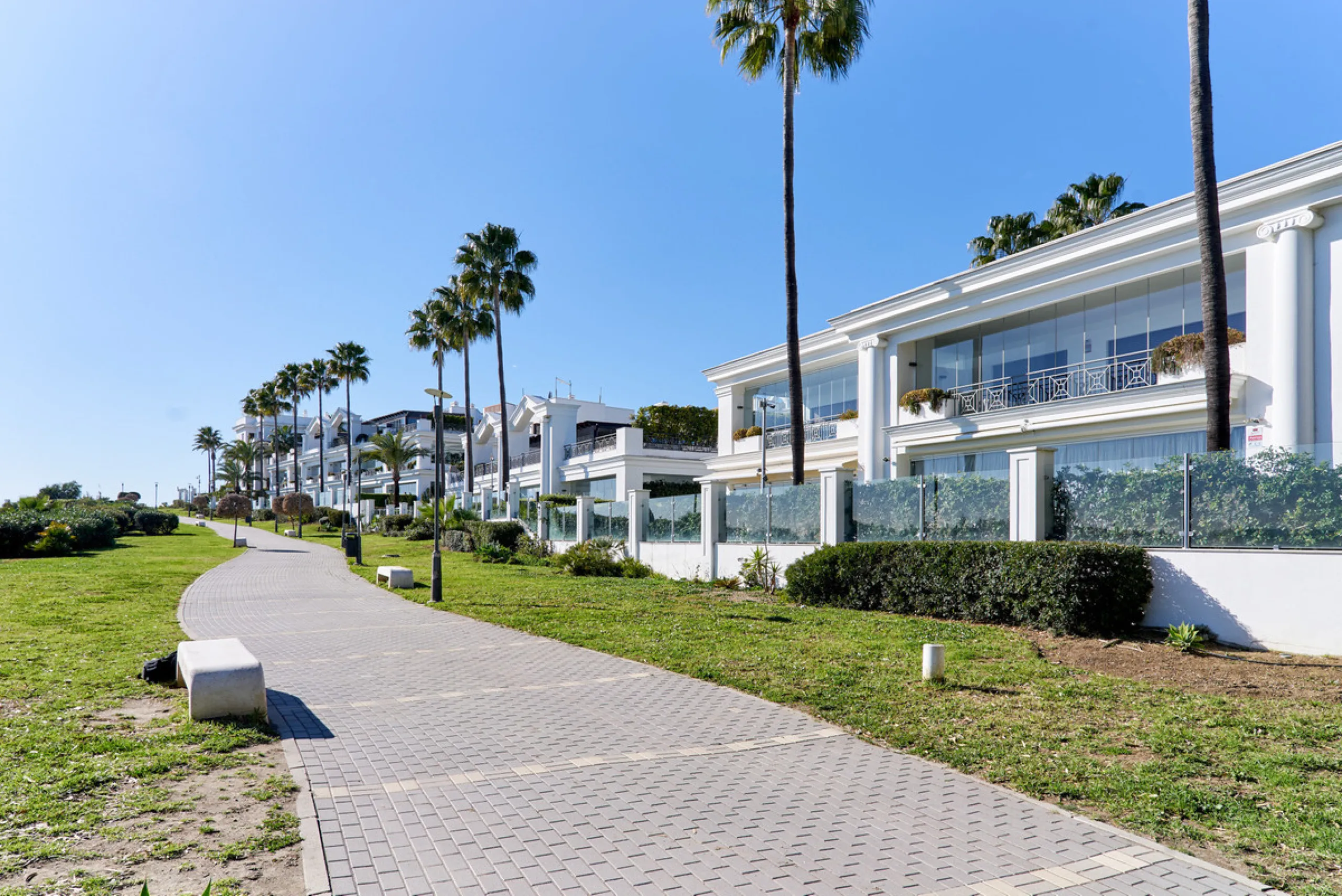 Situated in the prestigious Doncella Beach area, Estepona, this exquisite ground floor apartment offers an unparalleled blend of luxury and convenience. Boasting a prime front-line beach location, the property provides direct access to the sea and is with