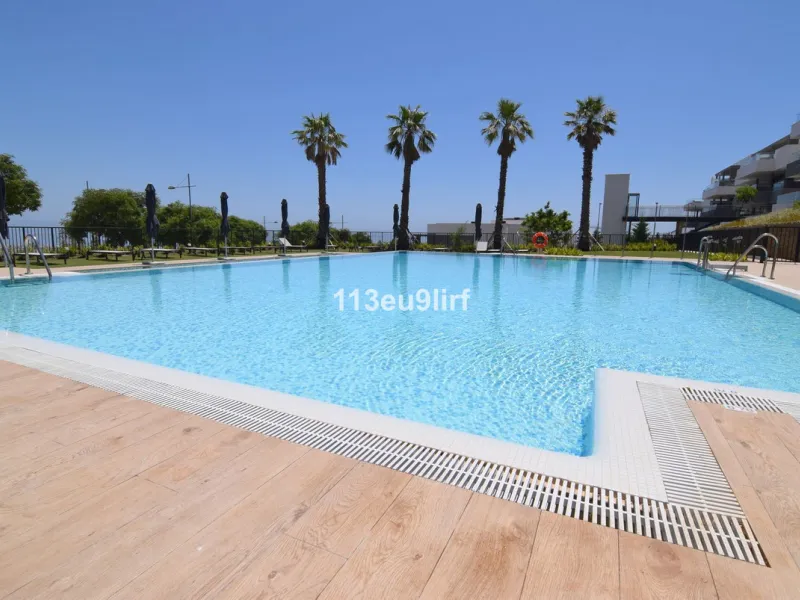 Situated in Las Mesas, just outside the center of Estepona, this spacious luxury apartment offers peace and tranquility but is still close to the beach, port and city center. It consists of a large living/dining room, a fully equipped kitchen with adjacen