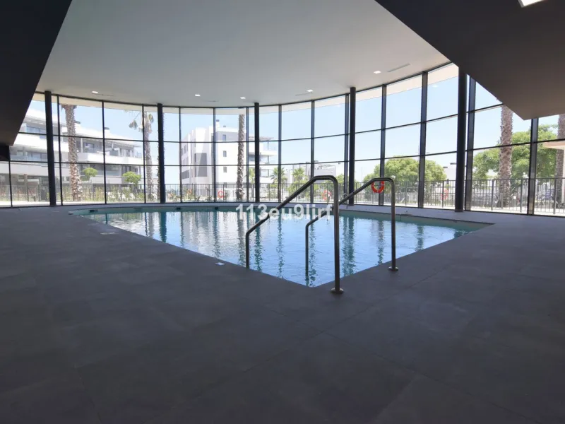 Situated in Las Mesas, just outside the center of Estepona, this spacious luxury apartment offers peace and tranquility but is still close to the beach, port and city center. It consists of a large living/dining room, a fully equipped kitchen with adjacen