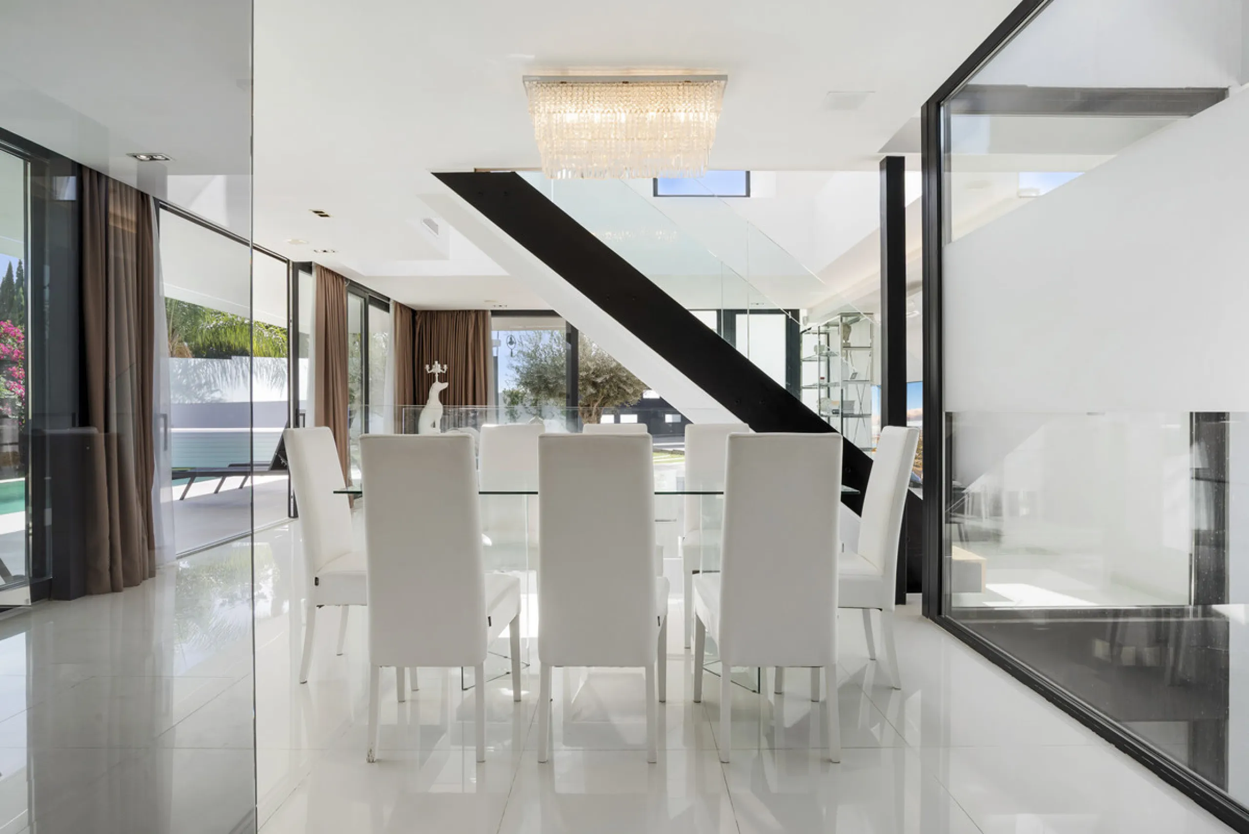 Nestled in the prestigious enclave of La Cerquilla, Villa La Cerquilla is a sanctuary of contemporary luxury surrounded by the beauty of Marbella's Golf Valley. Behind its private gates, the residence opens onto five generous double bedrooms, including a 