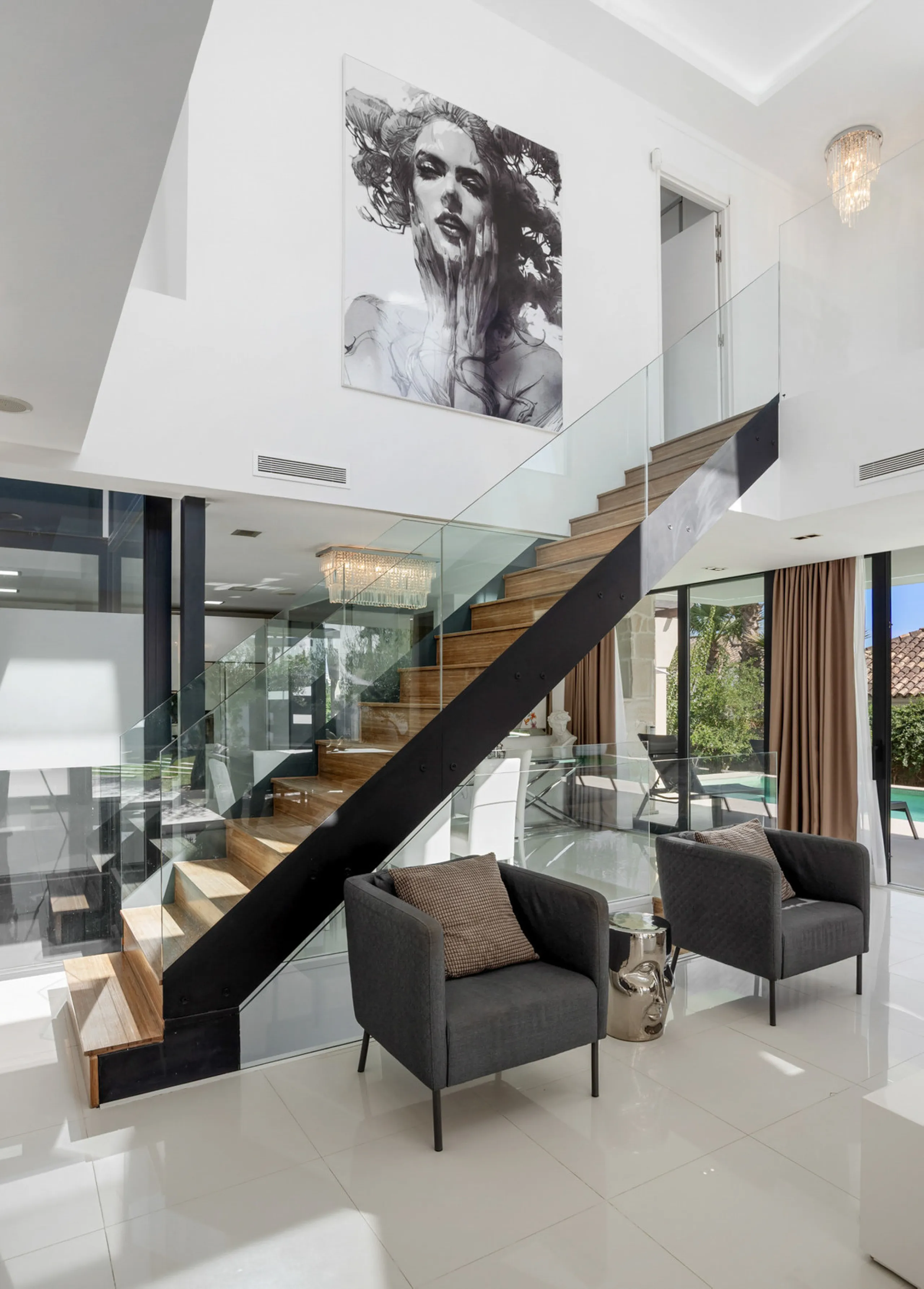 Nestled in the prestigious enclave of La Cerquilla, Villa La Cerquilla is a sanctuary of contemporary luxury surrounded by the beauty of Marbella's Golf Valley. Behind its private gates, the residence opens onto five generous double bedrooms, including a 